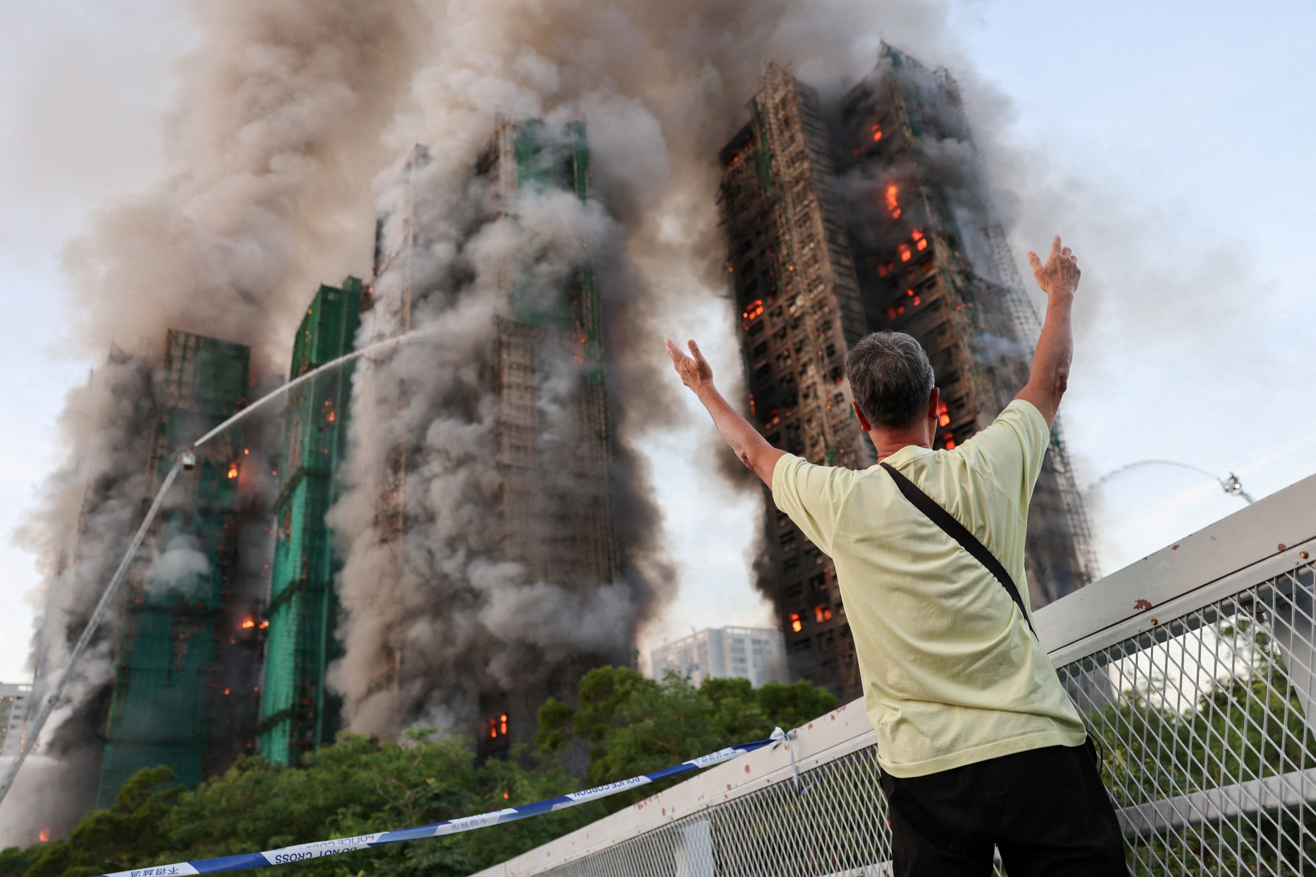 14 dead after fire engulfs residential high-rises in Hong Kong