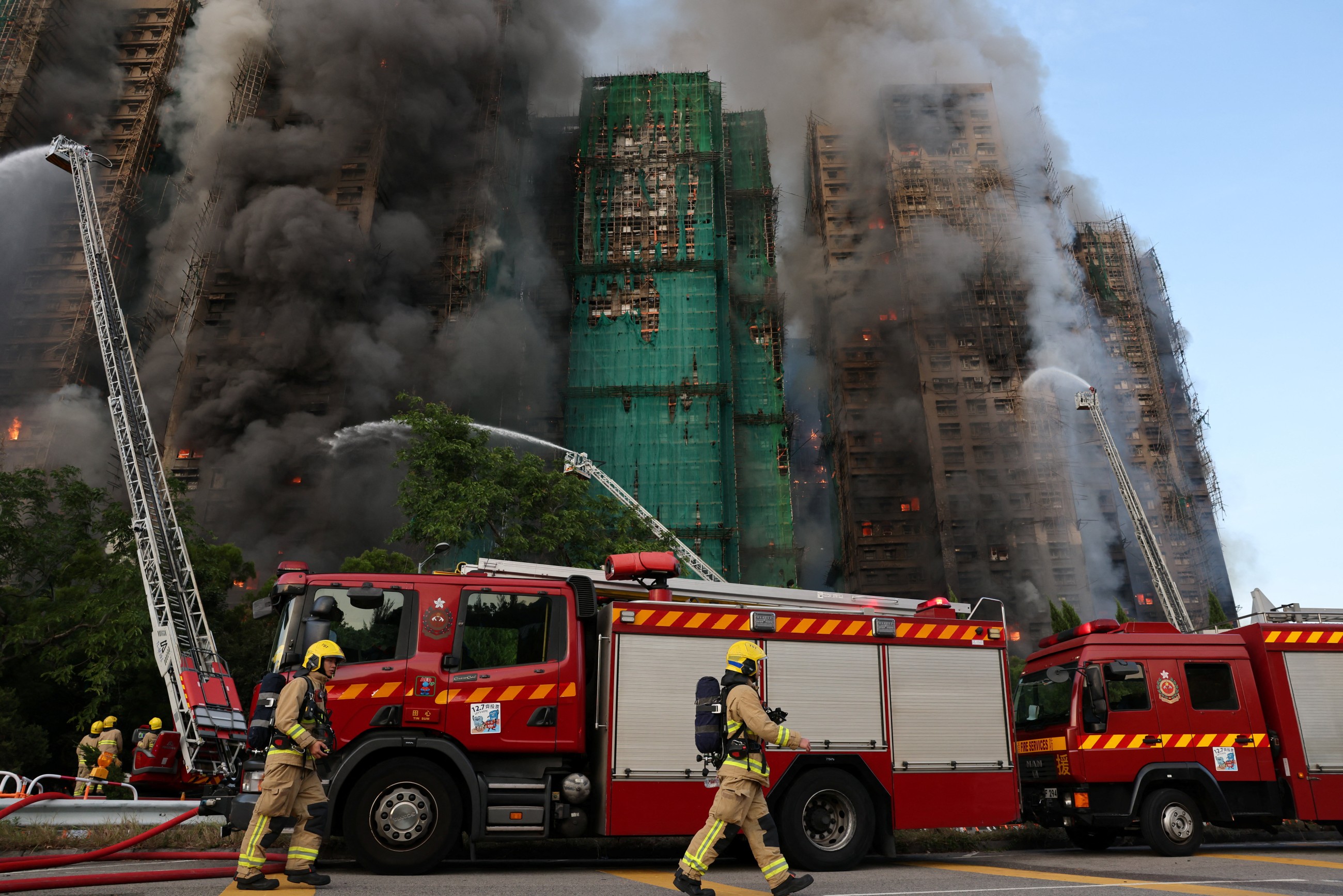 Construction firm bosses arrested as Hong Kong  fire toll hits 83