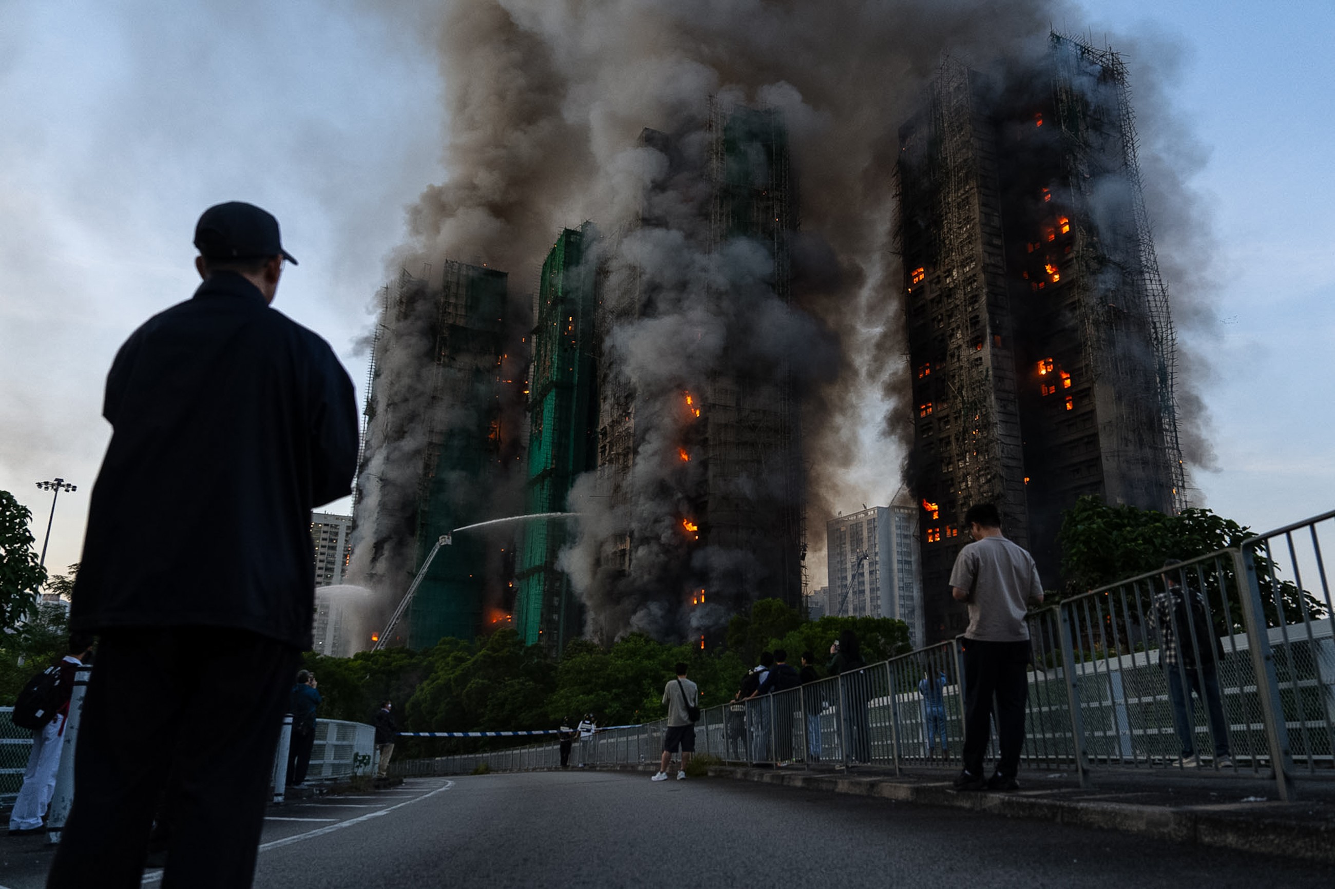 Construction firm bosses arrested as Hong Kong  fire toll hits 83