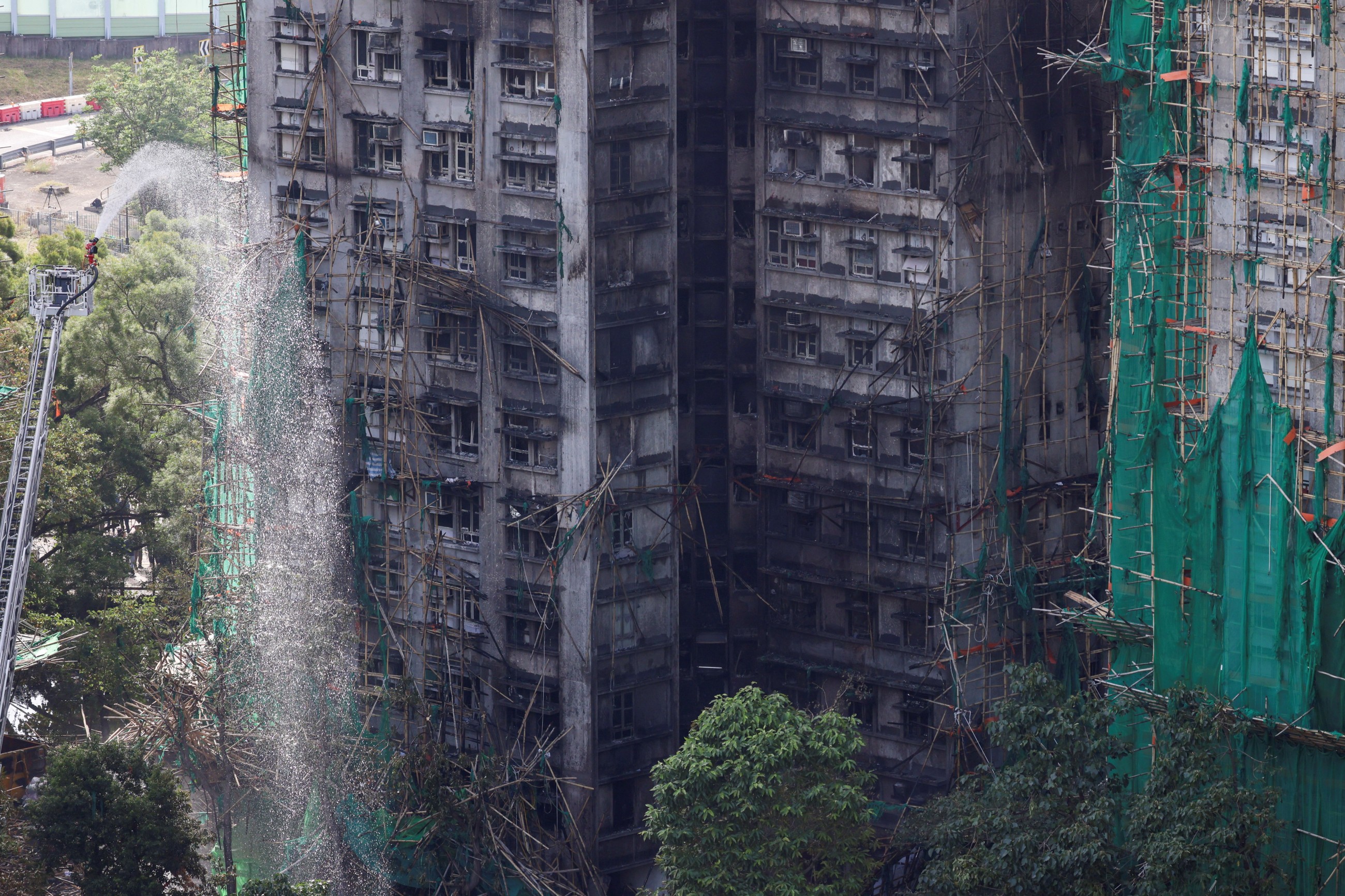 Hong Kong's deadliest blaze in decades kills at least 94, scores missing