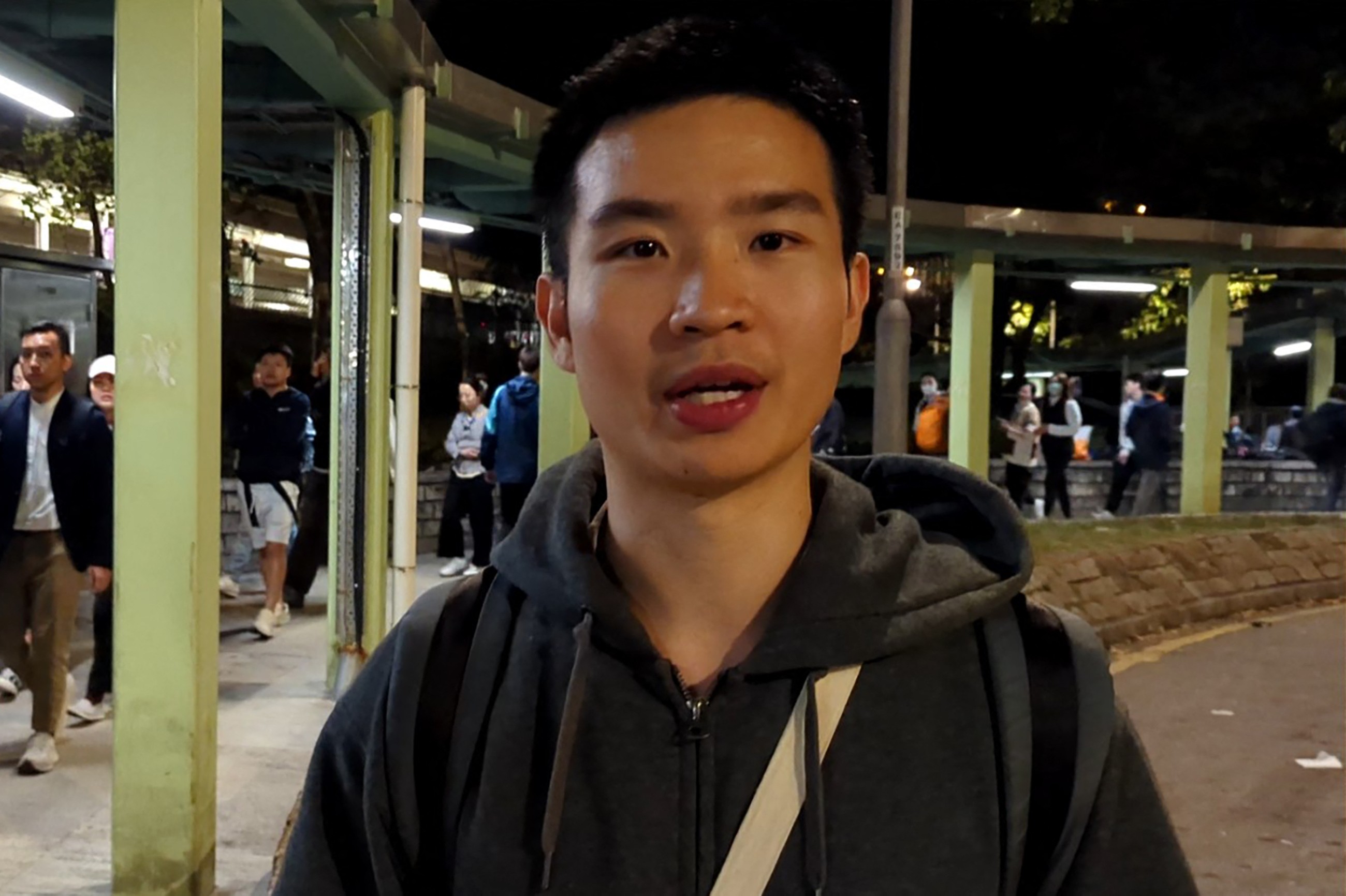 Mourners flock to site of deadly Hong Kong blaze as Beijing warns against protests