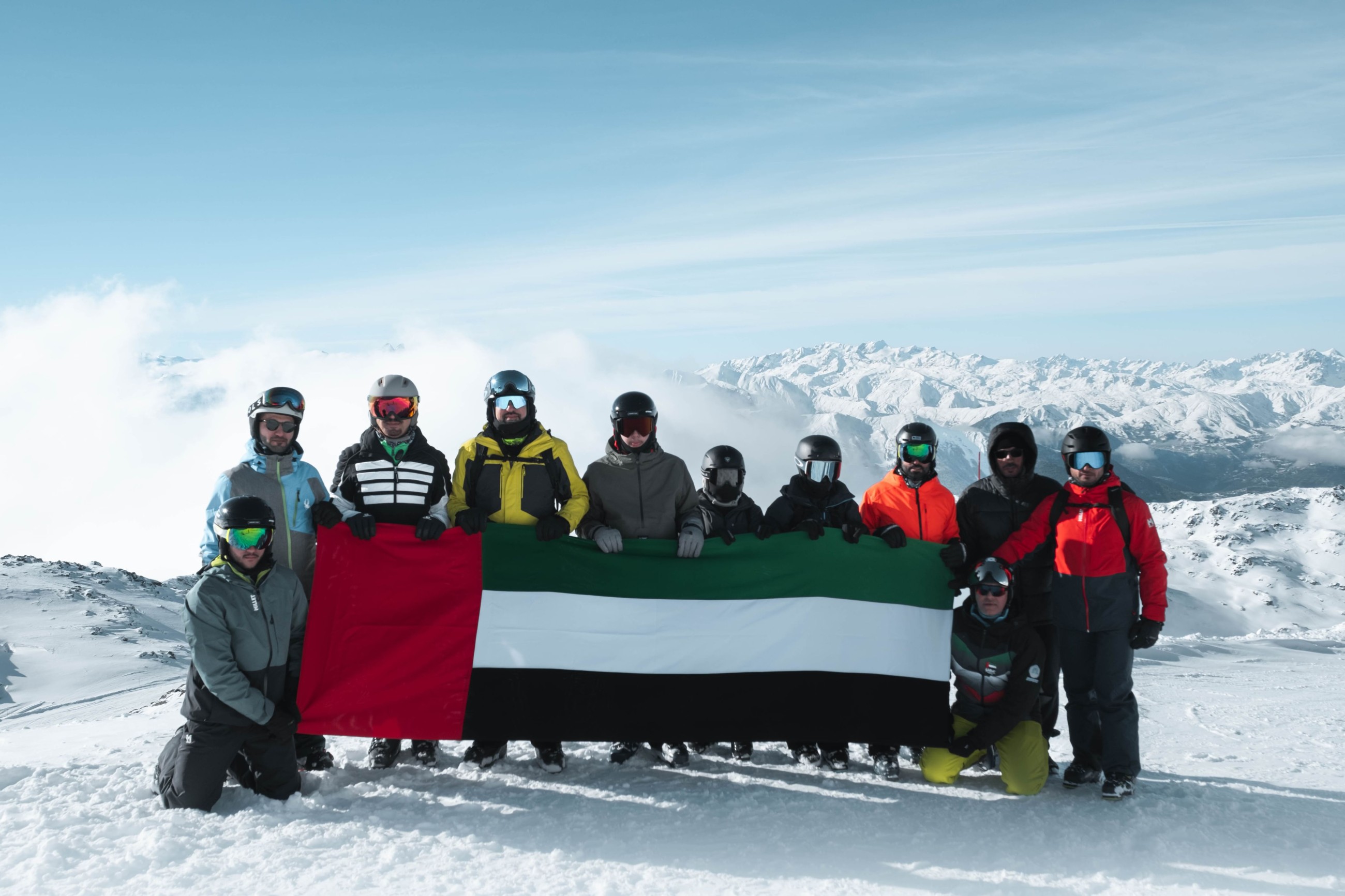 UAE flag, portrait of Zayed and Rashid unfurled atop Alps as part of Eid Al Etihad celebrations