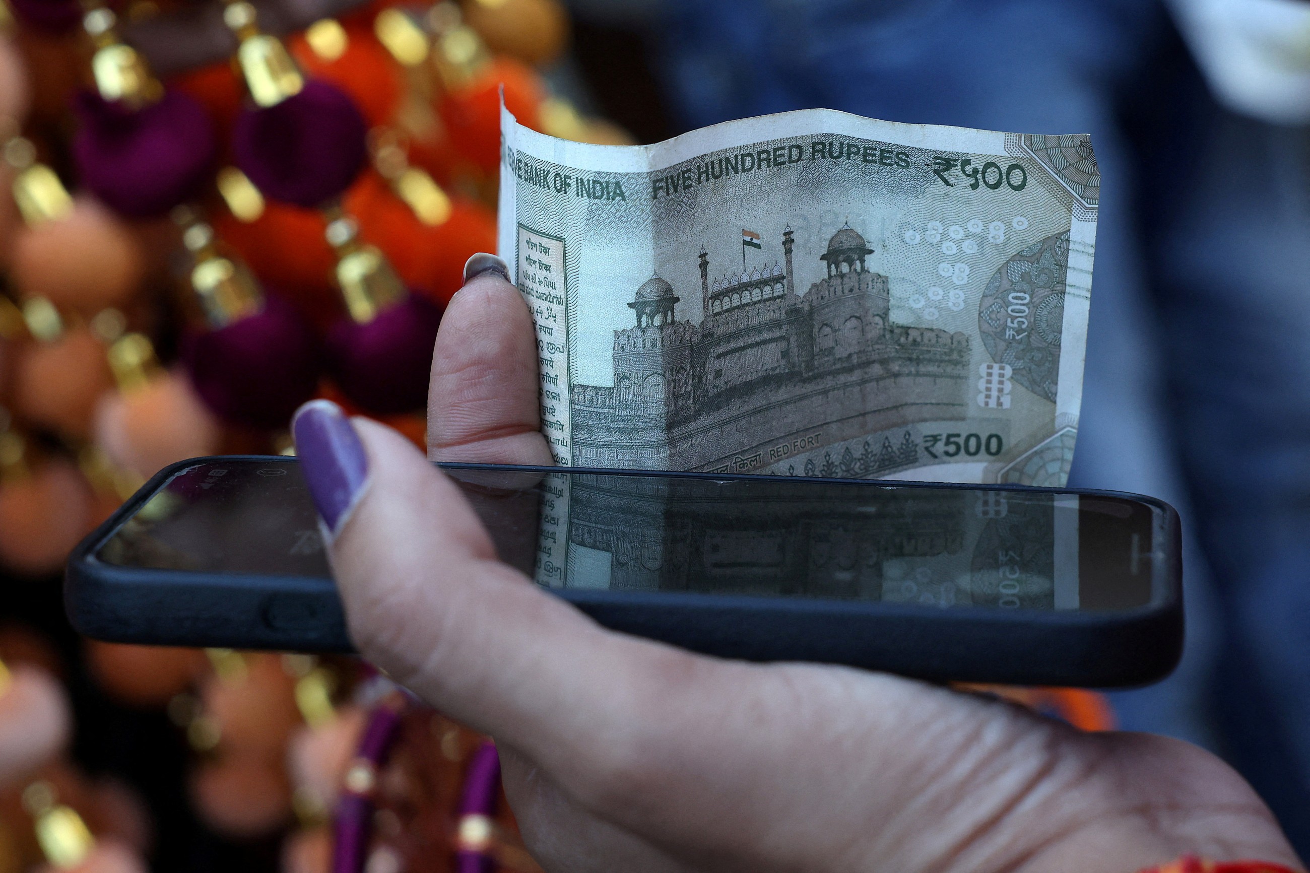 Indian rupee crashes to record low beyond 90 per US dollar