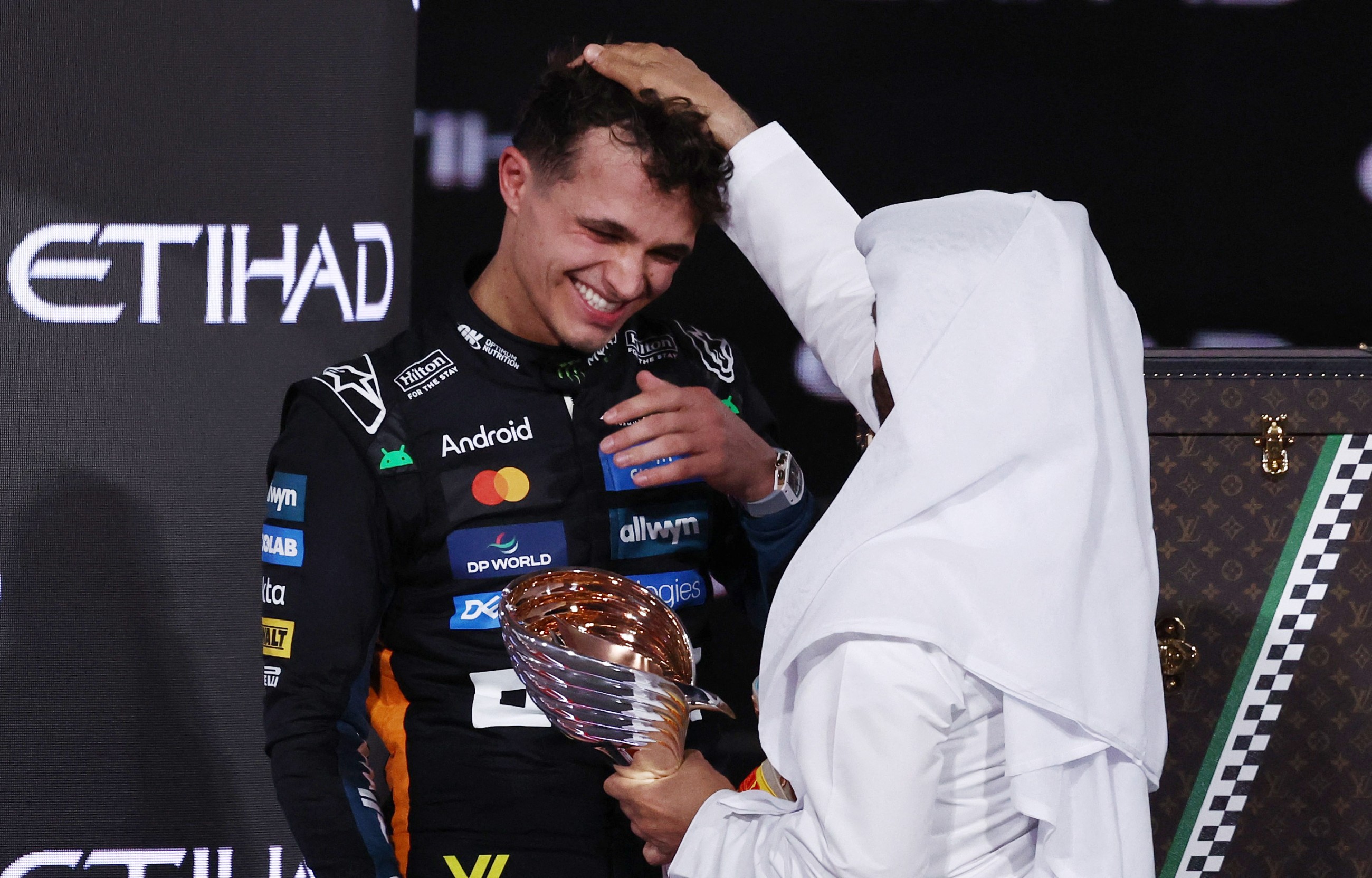 Tearful Norris claims 'amazing' Formula One world champion in Abu Dhabi