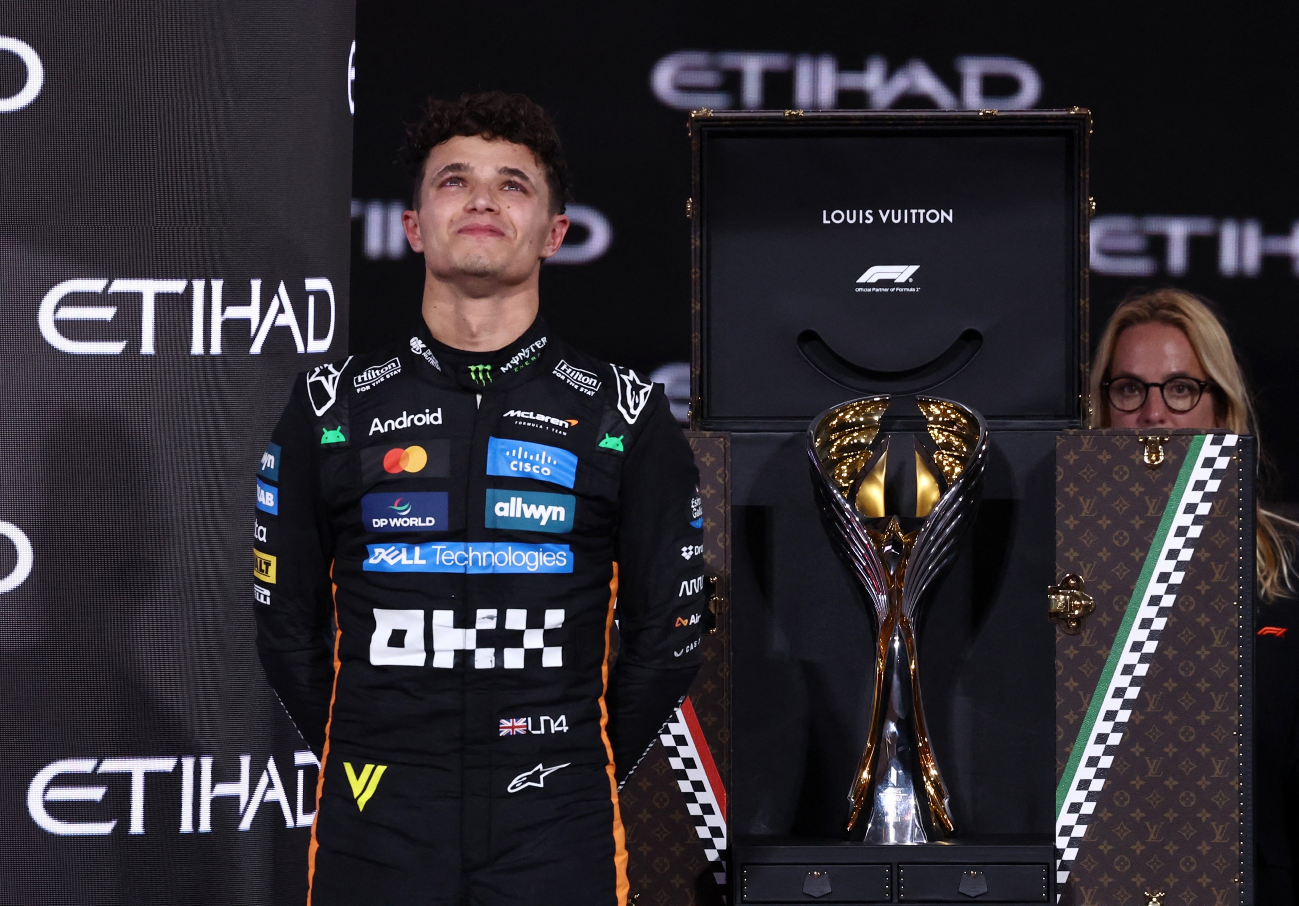 Tearful Norris claims 'amazing' Formula One world champion in Abu Dhabi