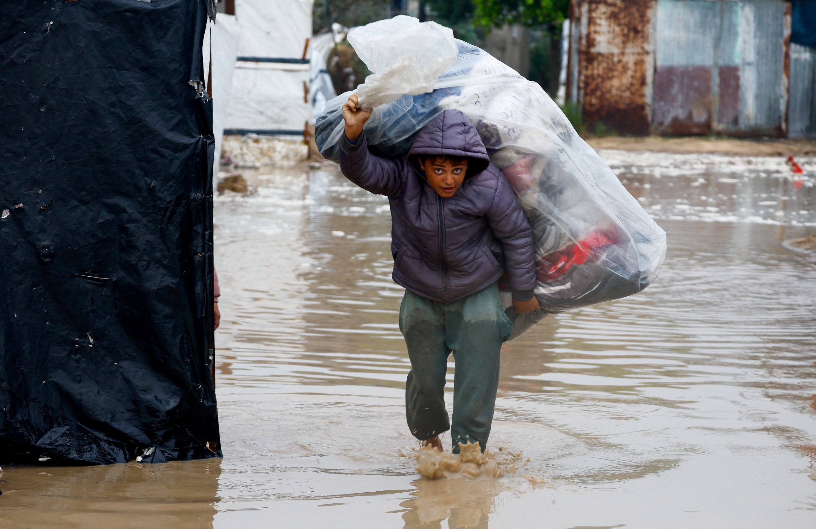 UN agency warns displaced Gazans face cold, floods as emergency supplies blocked