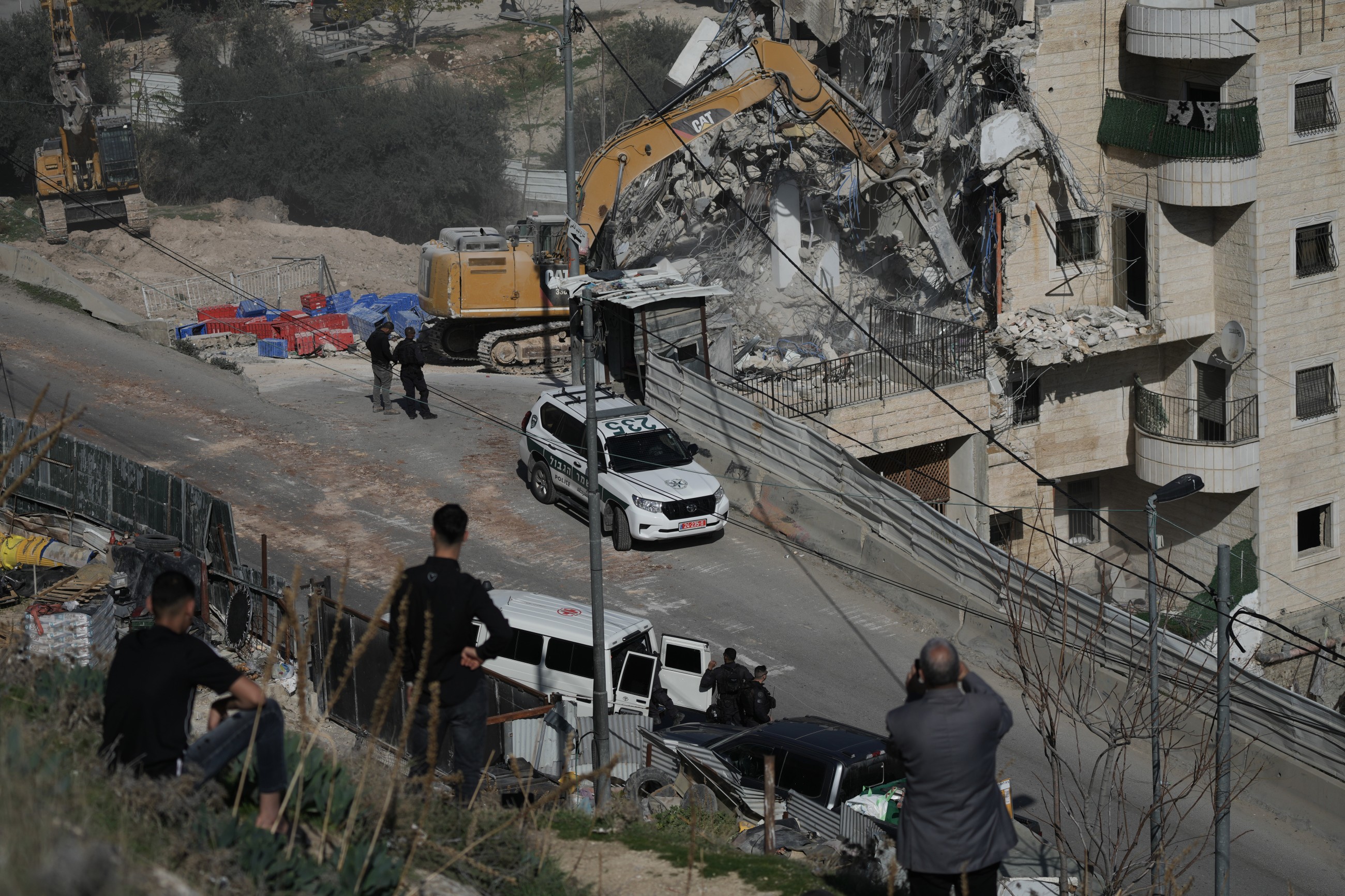 Israel demolishes east Jerusalem building, evicting Palestinians
