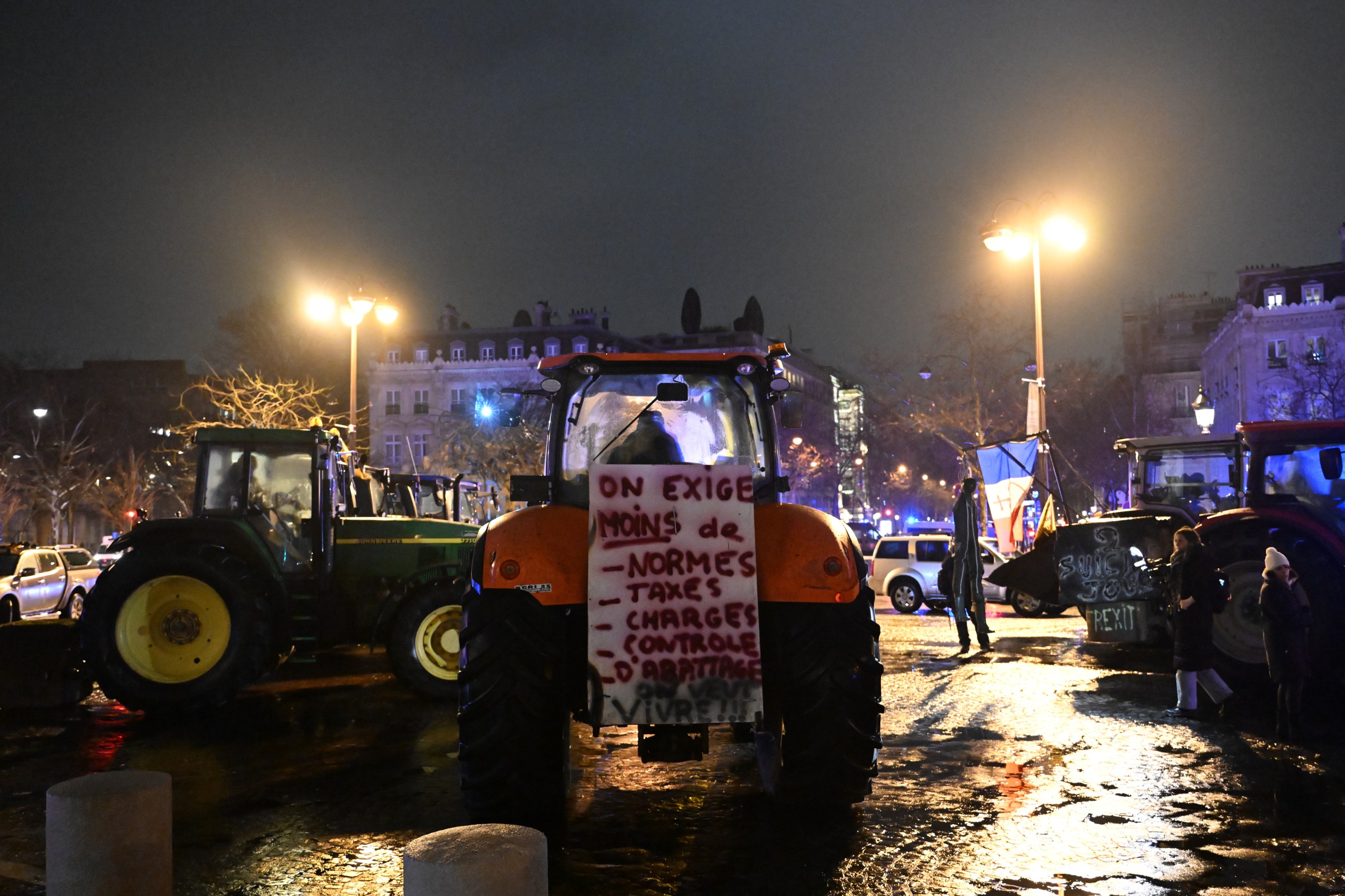 Farmers enter Paris on tractors in protest at trade deal