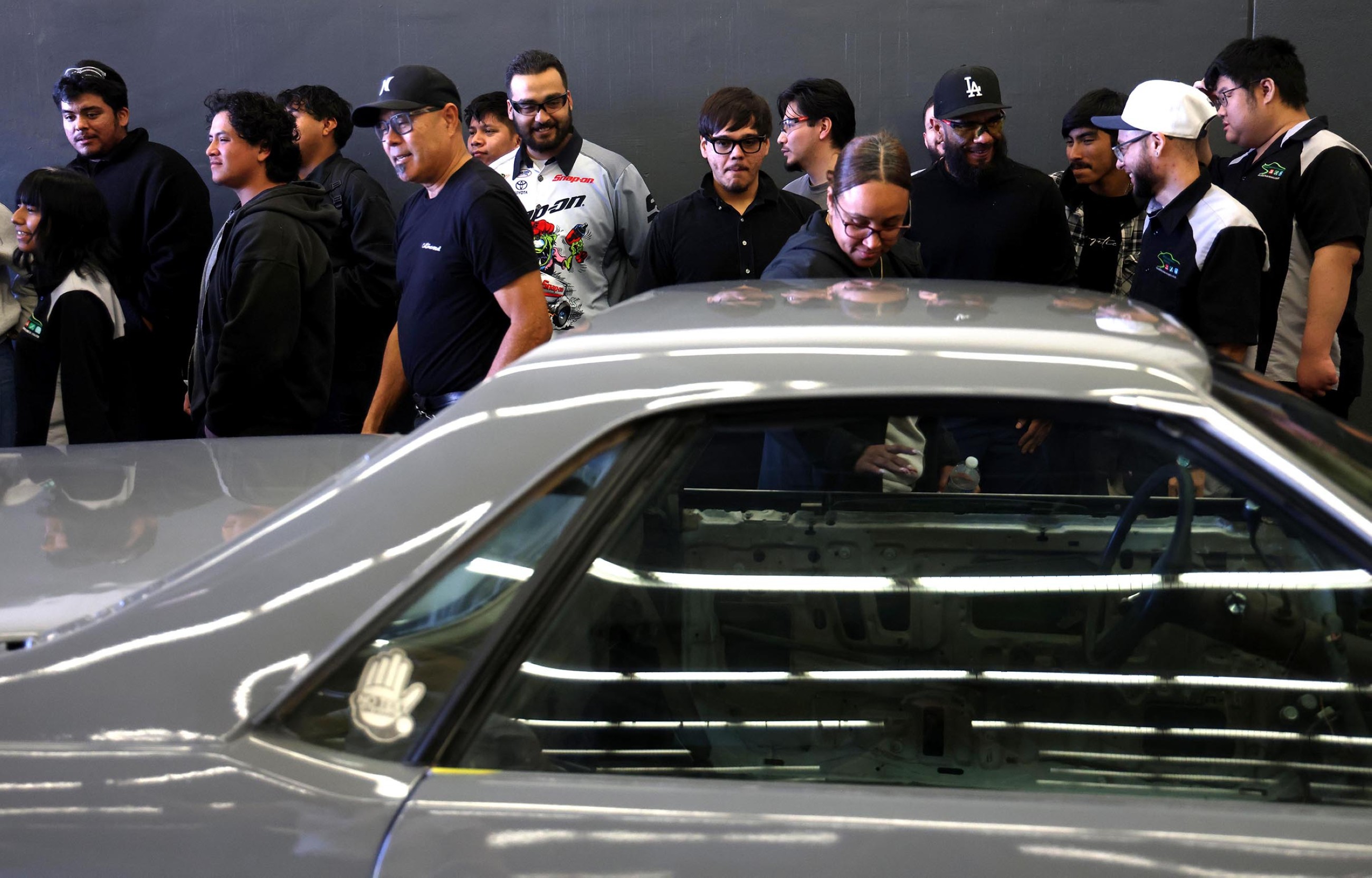 Community college students basically fix cars for free