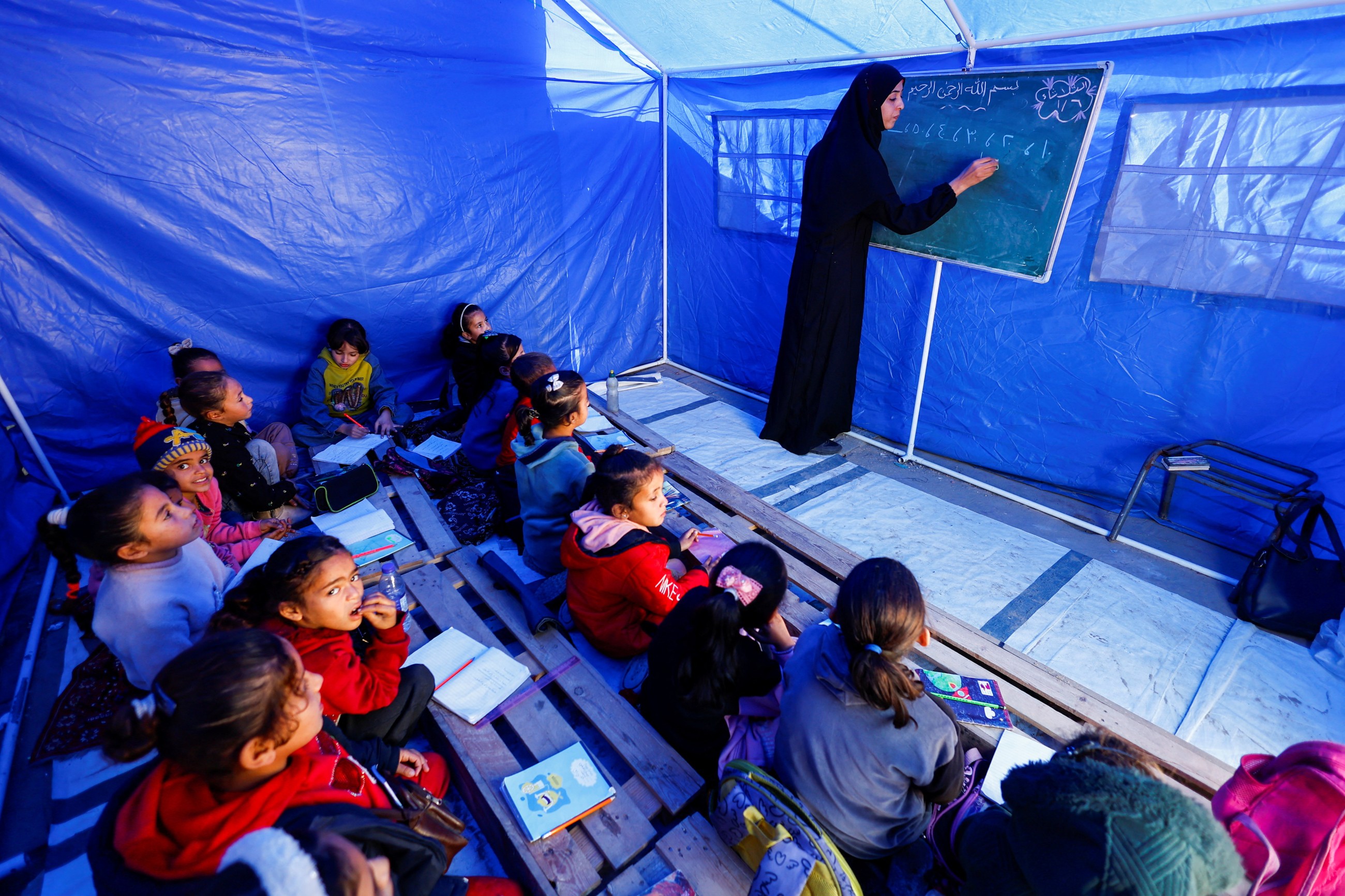 School resumes in tents under shadow of Gaza's 'yellow line'
