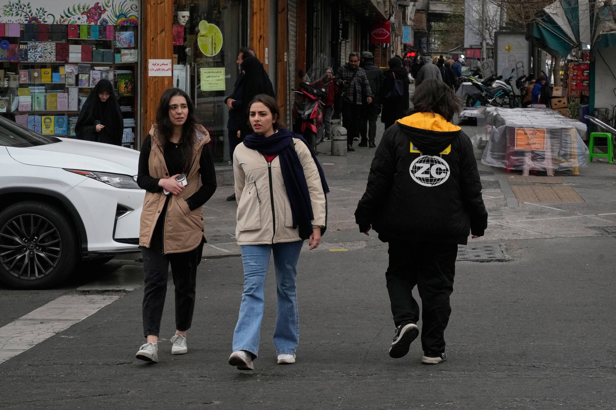 Iran vows to defend itself as Trump says will 'watch it and see'