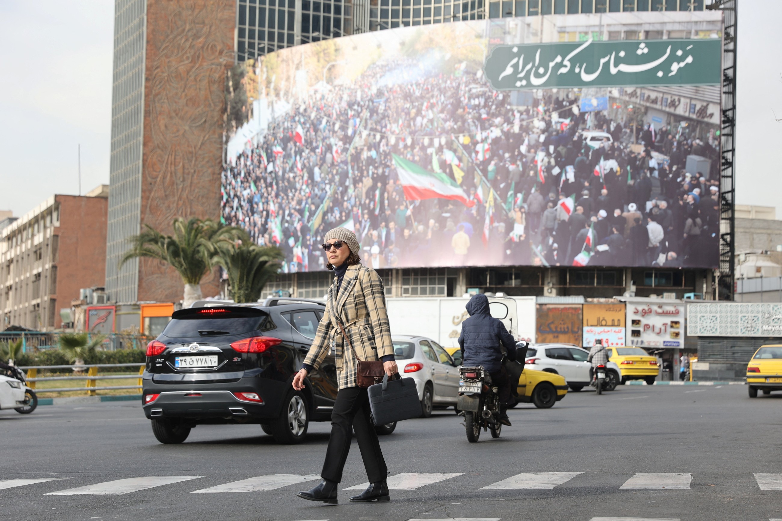 Iran vows to defend itself as Trump says will 'watch it and see'