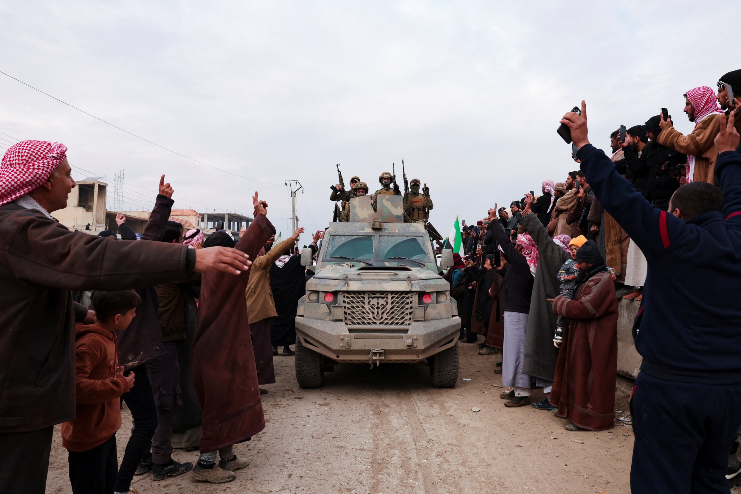 Syrian forces enter northern towns after Kurdish fighters withdraw