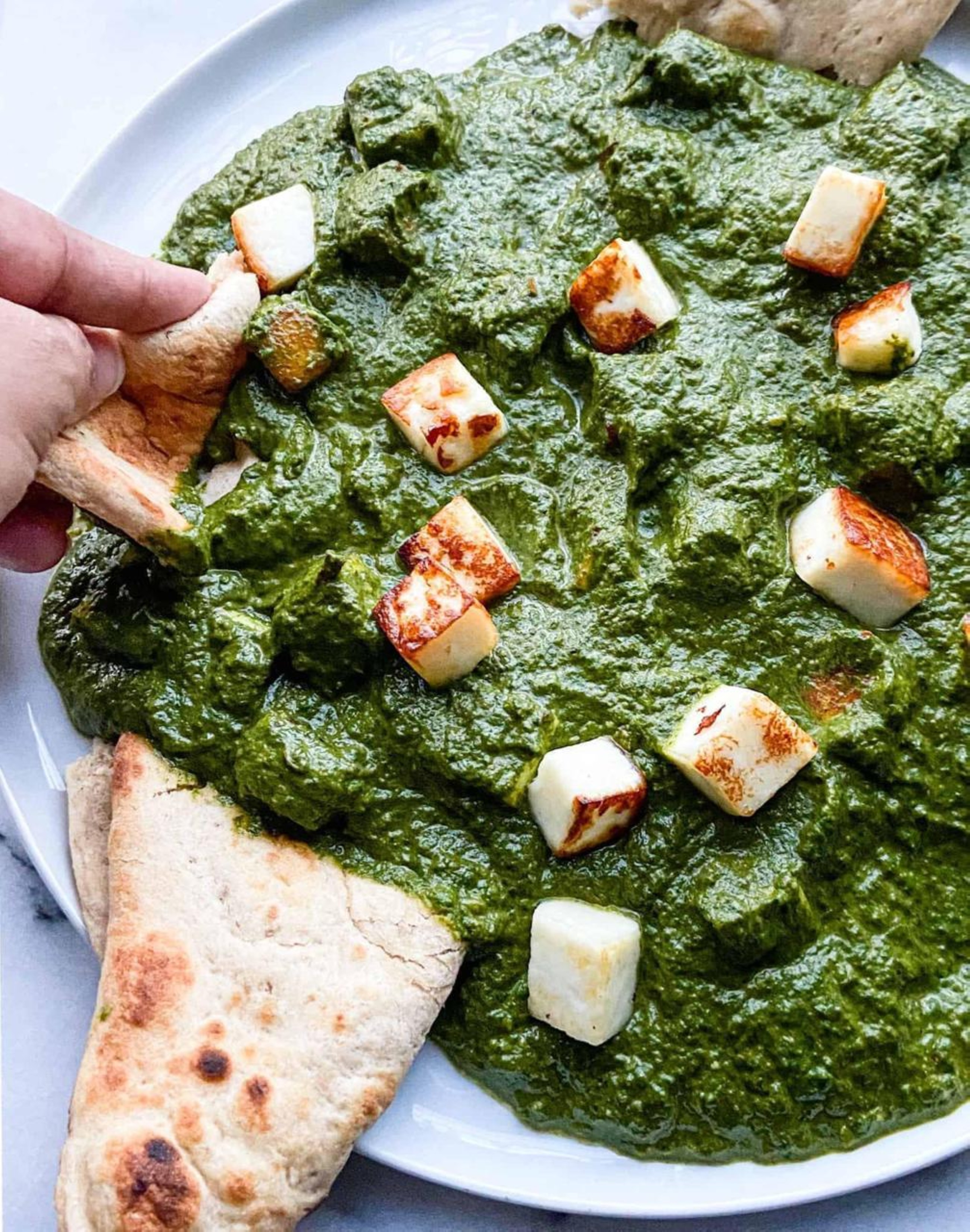 Indian couple wins $200,000 lawsuit against &lsquo;food racism&rsquo; at American university after &lsquo;pungent&rsquo; palak paneer comment