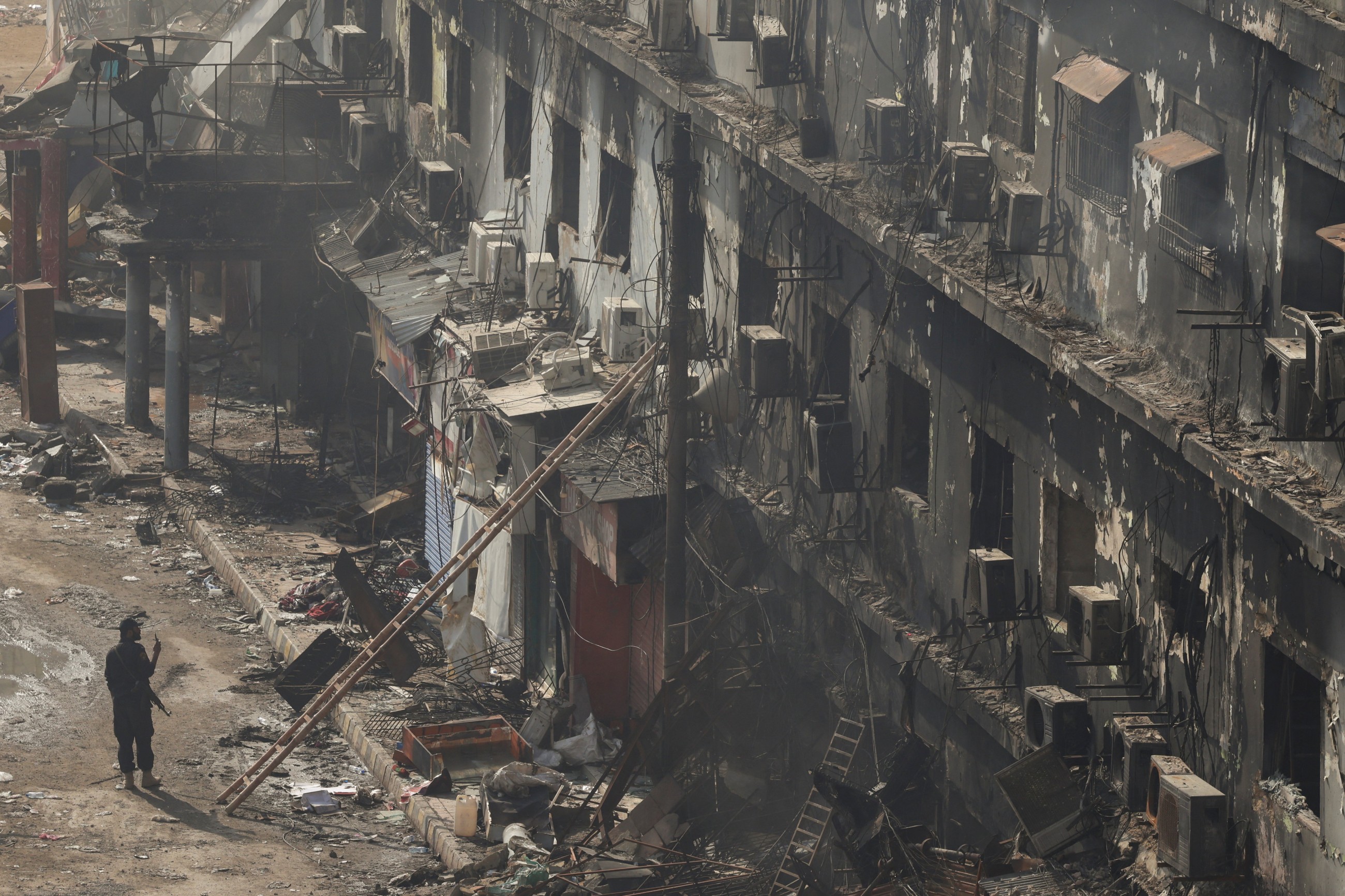 Dozens of body parts are found after shopping plaza fire in Pakistani city of Karachi