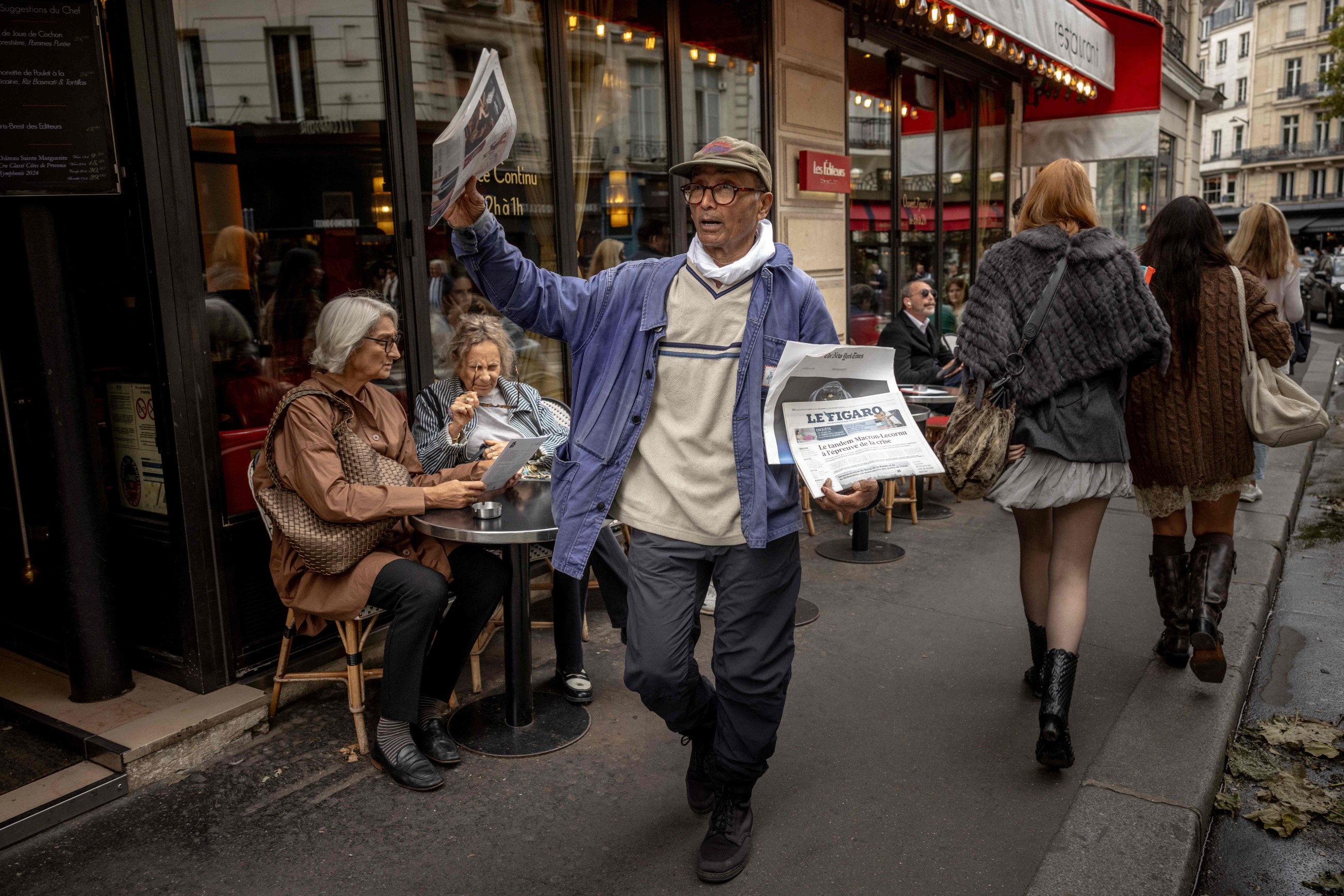 'I am a knight:' Paris' last newspaper hawker gets top French award