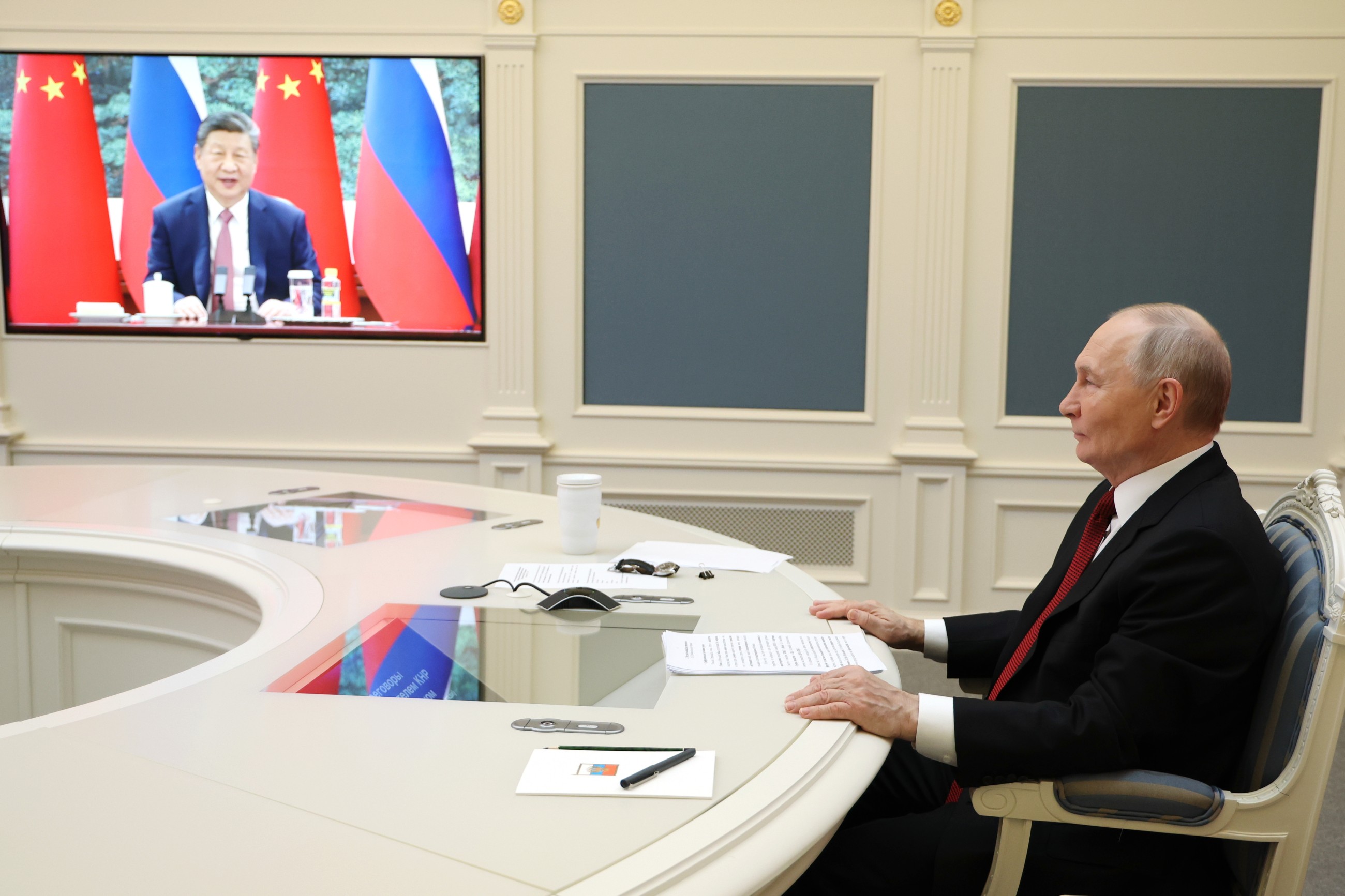 Xi, Putin reinforce ties in video call