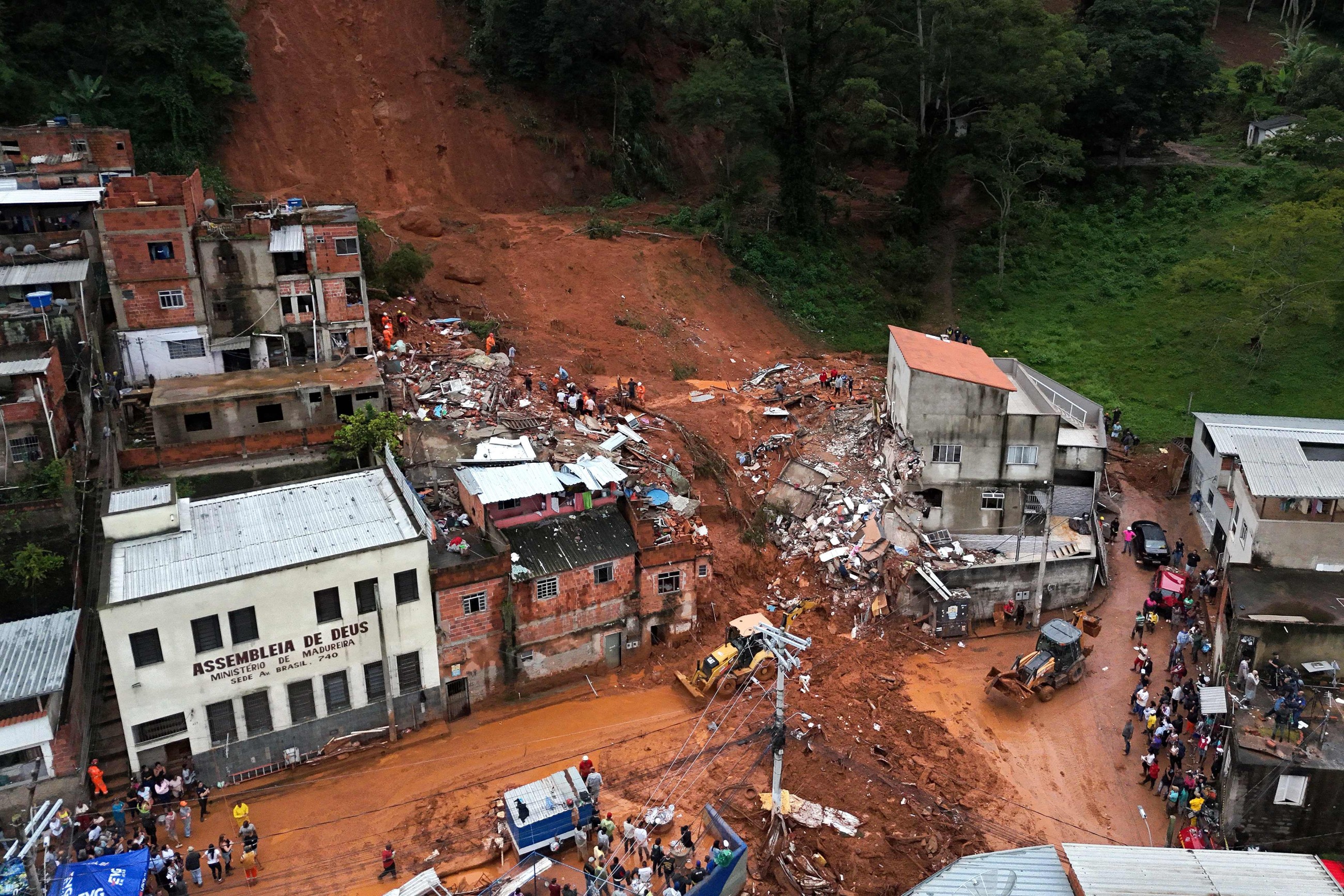Rescuers search for missing after deluge kills 30 in Brazil
