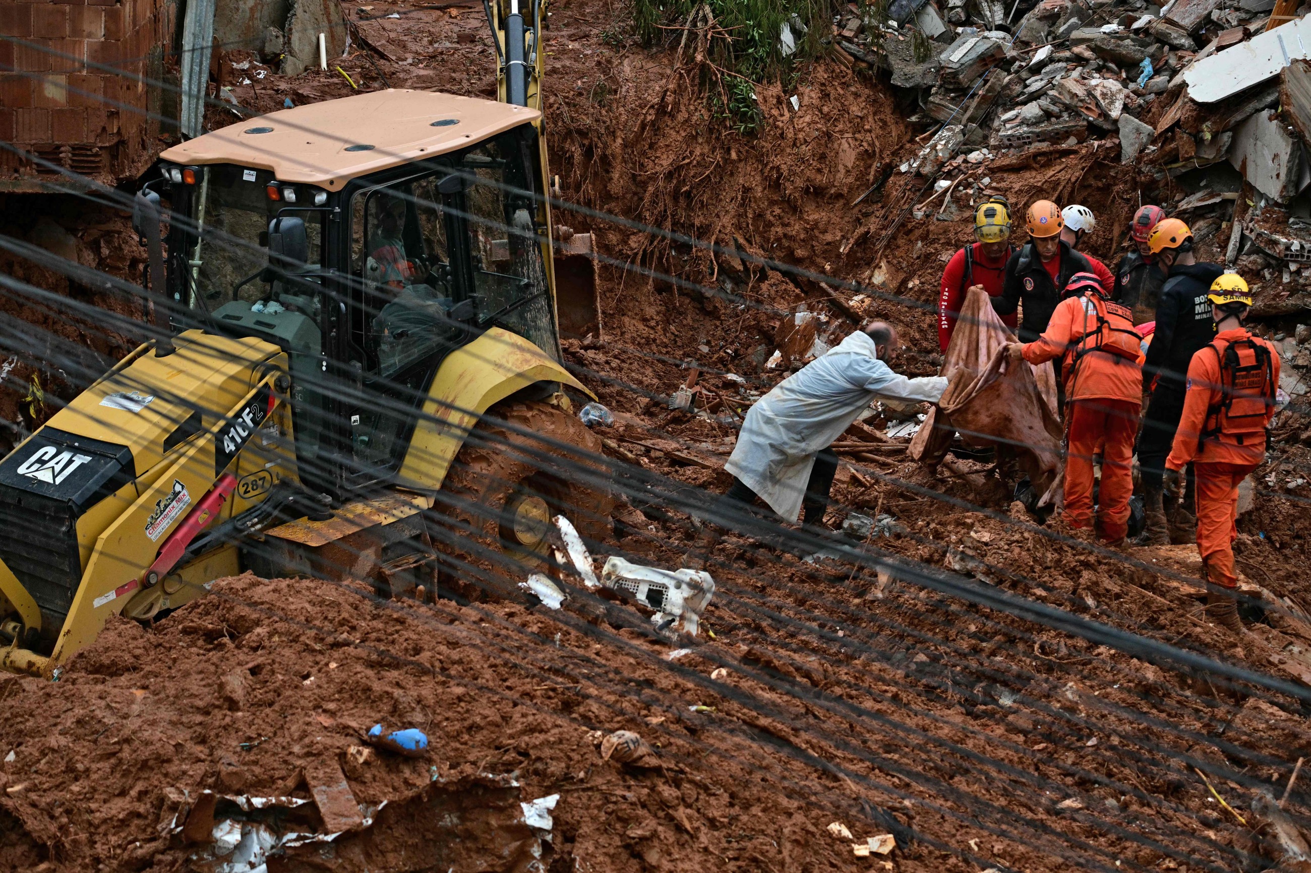 Rescuers search for missing after deluge kills 30 in Brazil