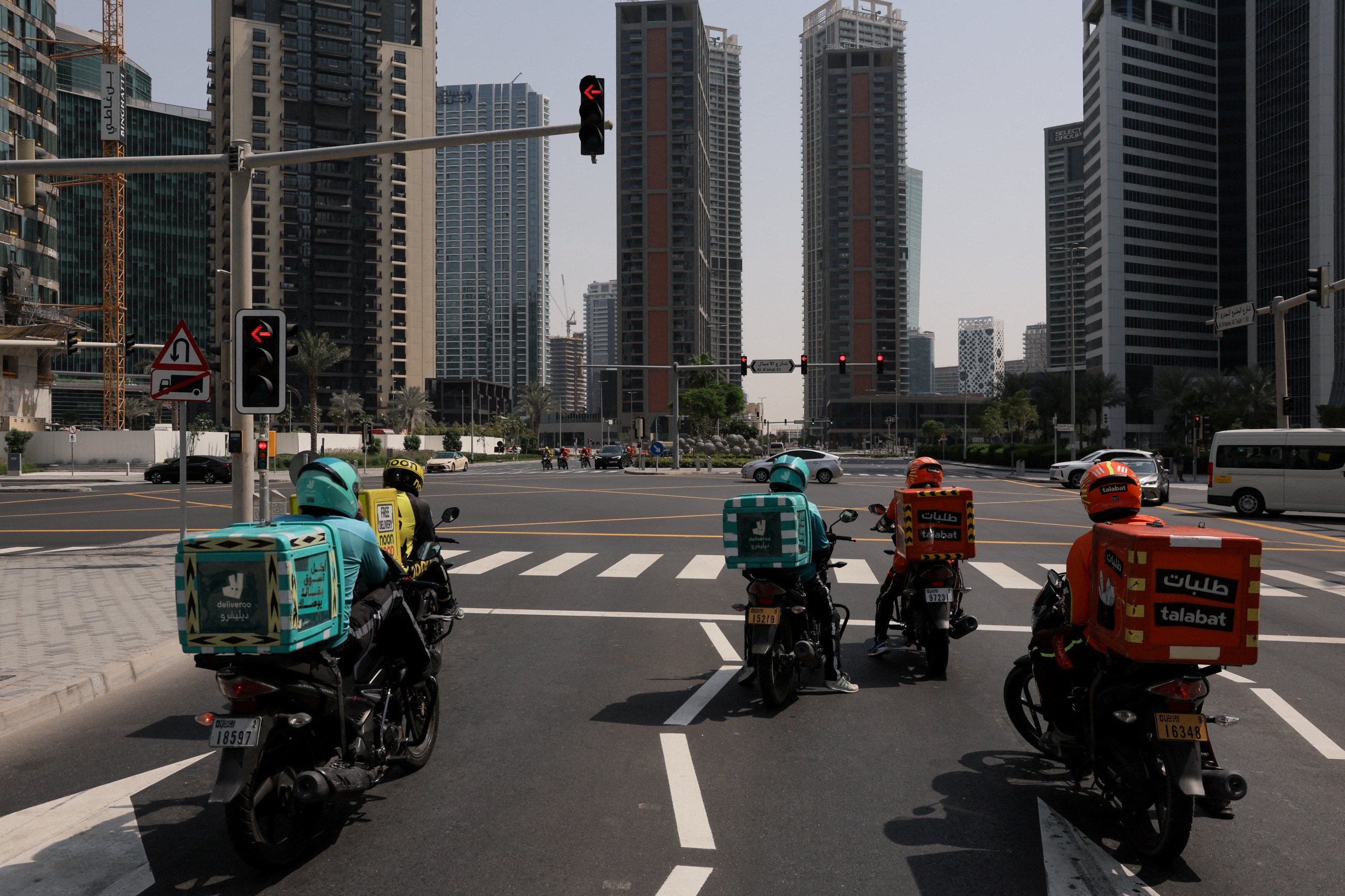 Delivery drivers dodge debris to keep Gulf fed under Iranian attacks