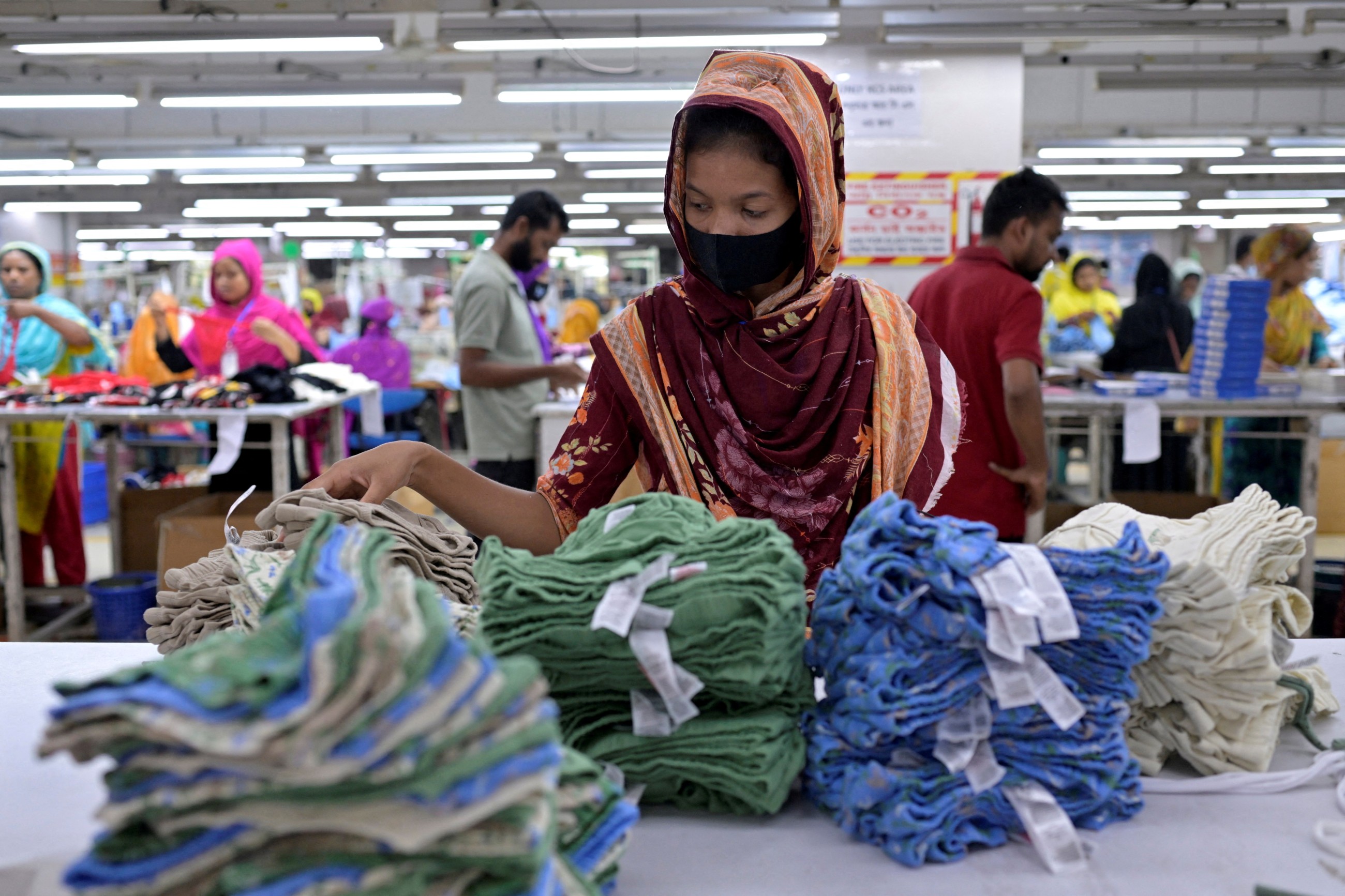 Fast fashion garments pile up in South Asia as war grounds planes