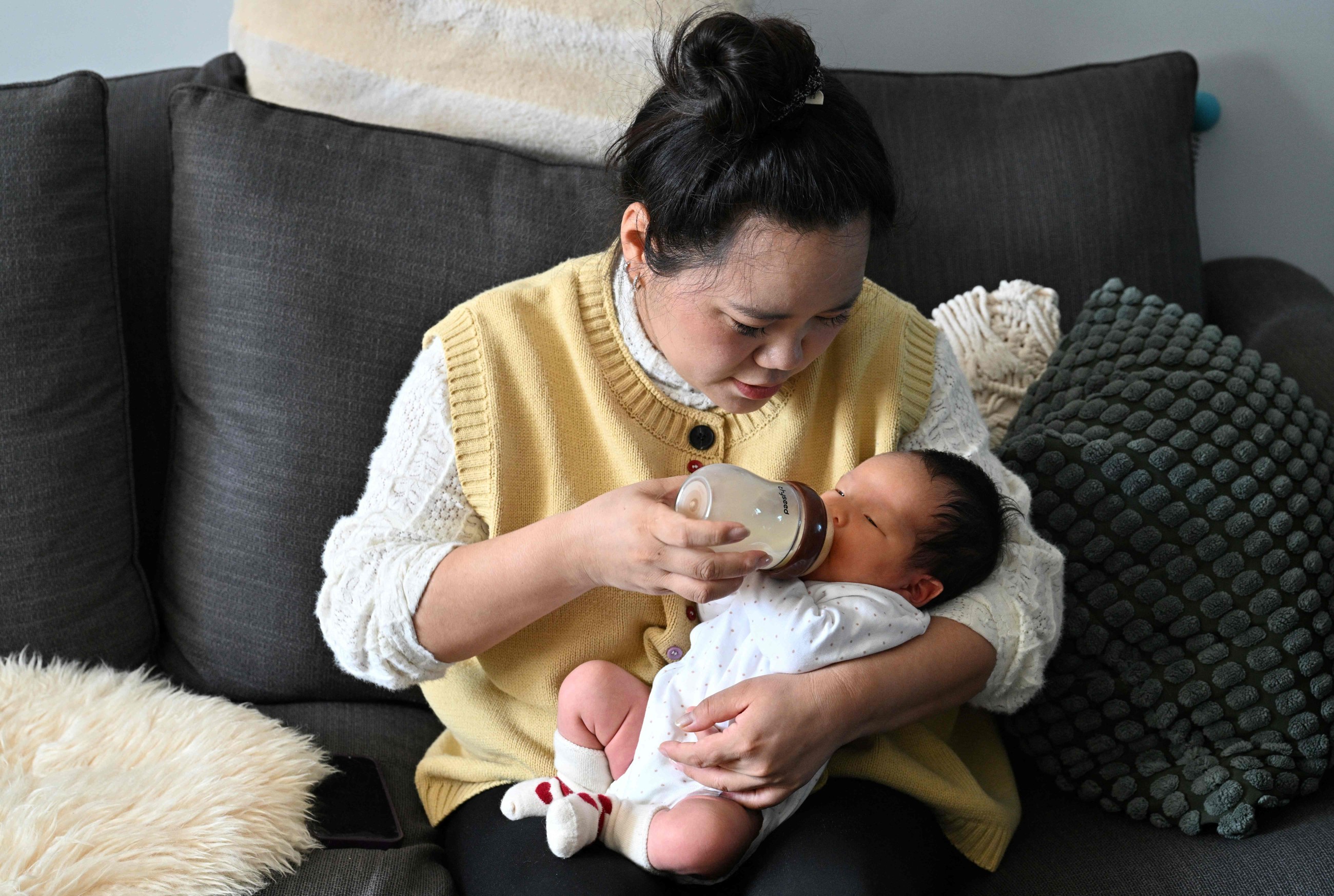 Young Chinese parents tighten belts as childcare costs rise