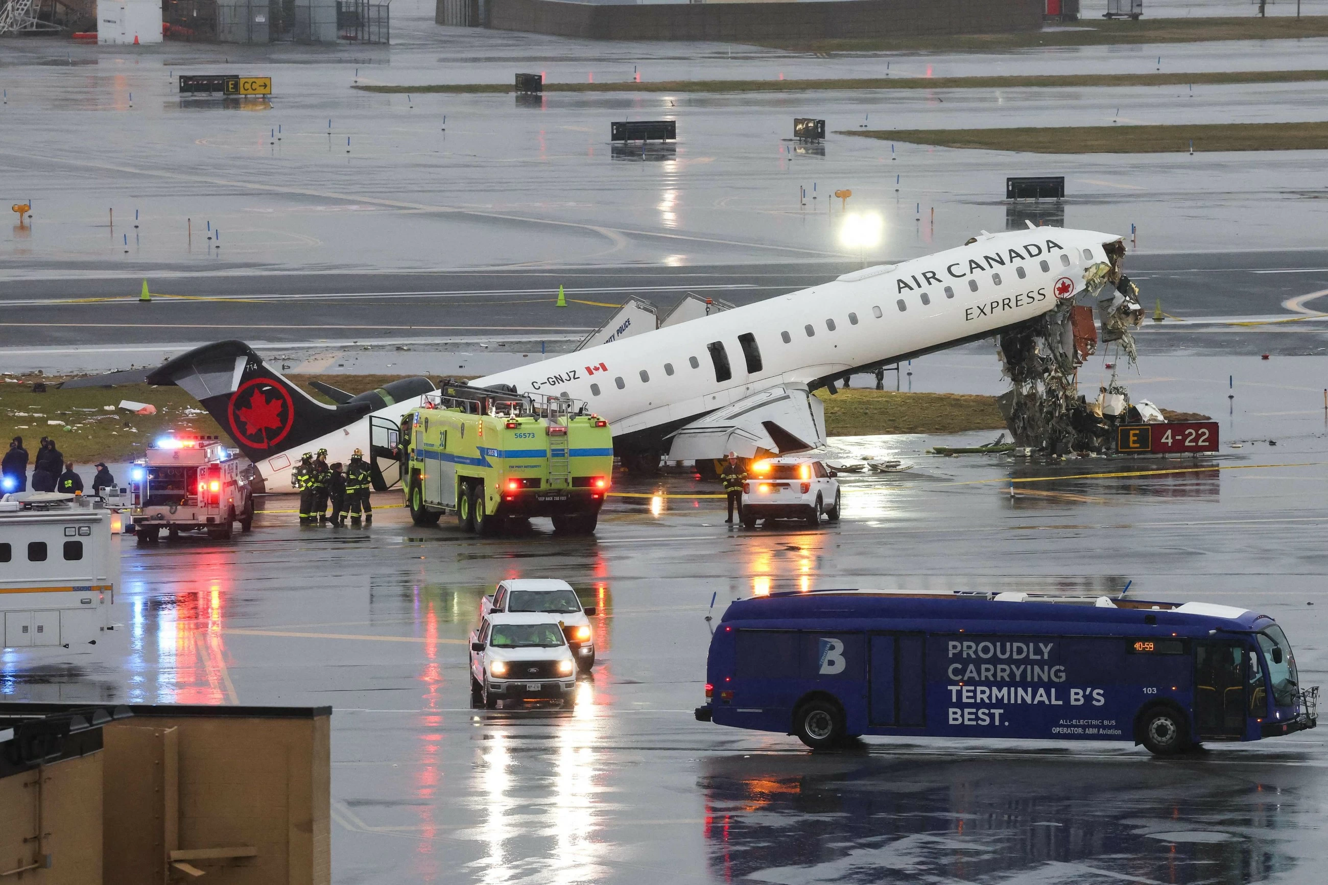 Two pilots dead after passenger jet crashes into fire truck at LaGuardia Airport in New York