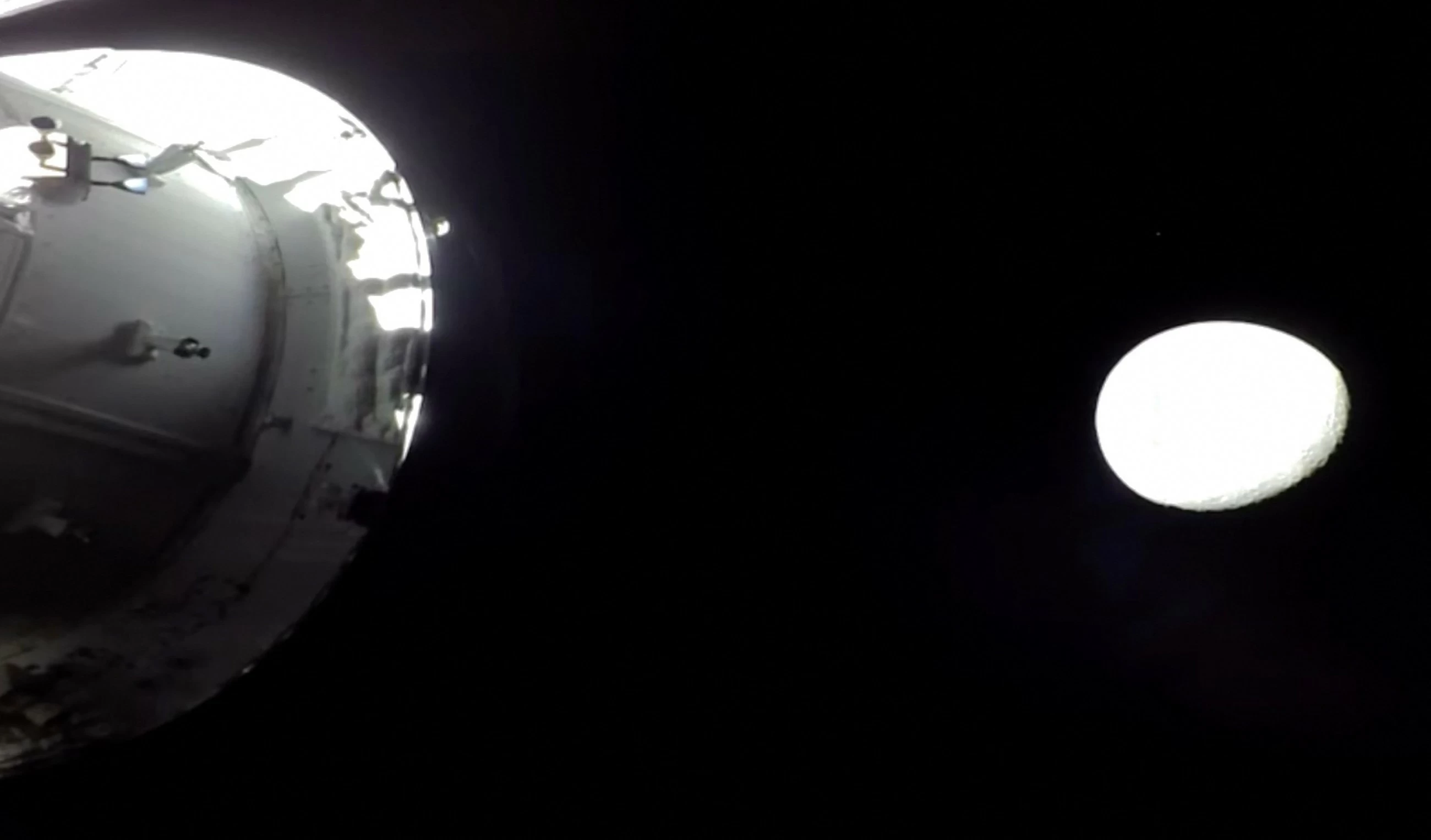 Artemis crew reaches the moon, approaches record-breaking distance from Earth