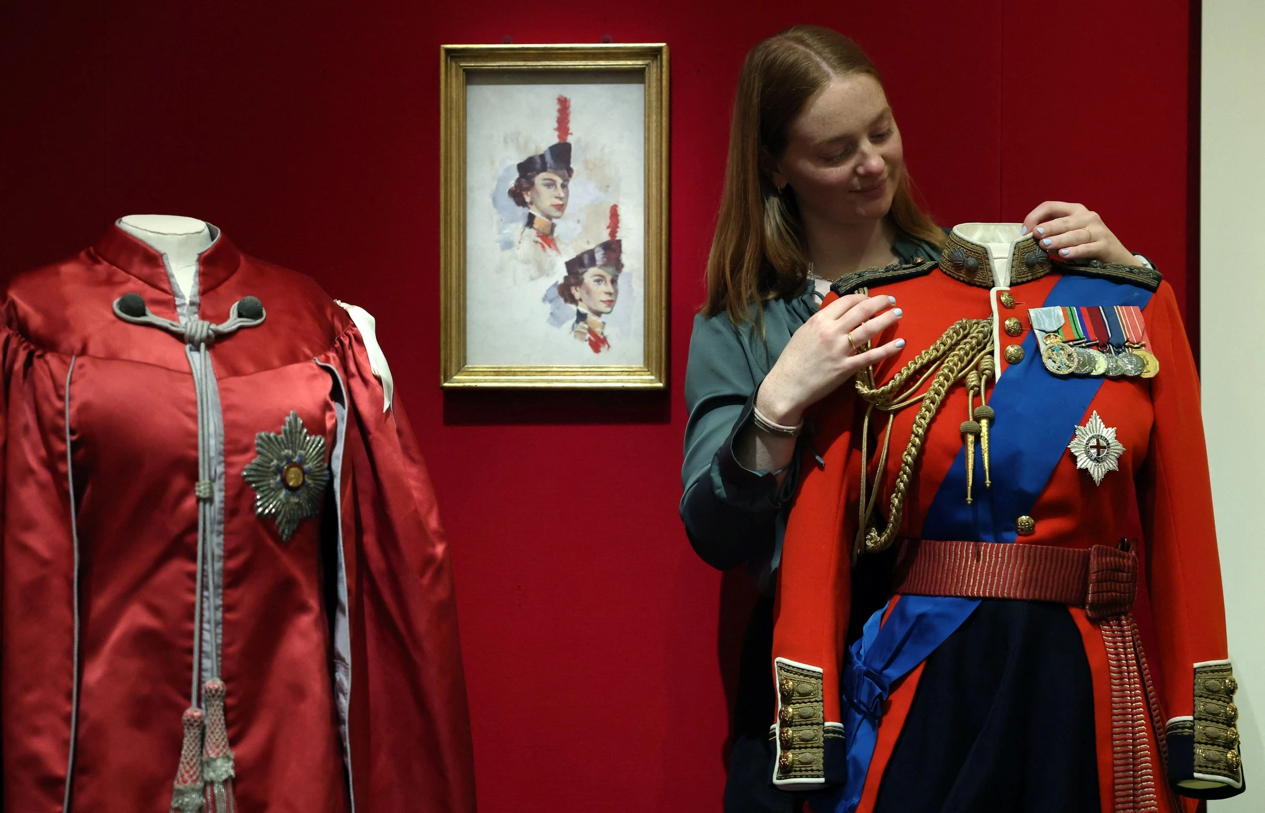 Queen Elizabeth II’s fashion takes centrestage at Buckingham Palace