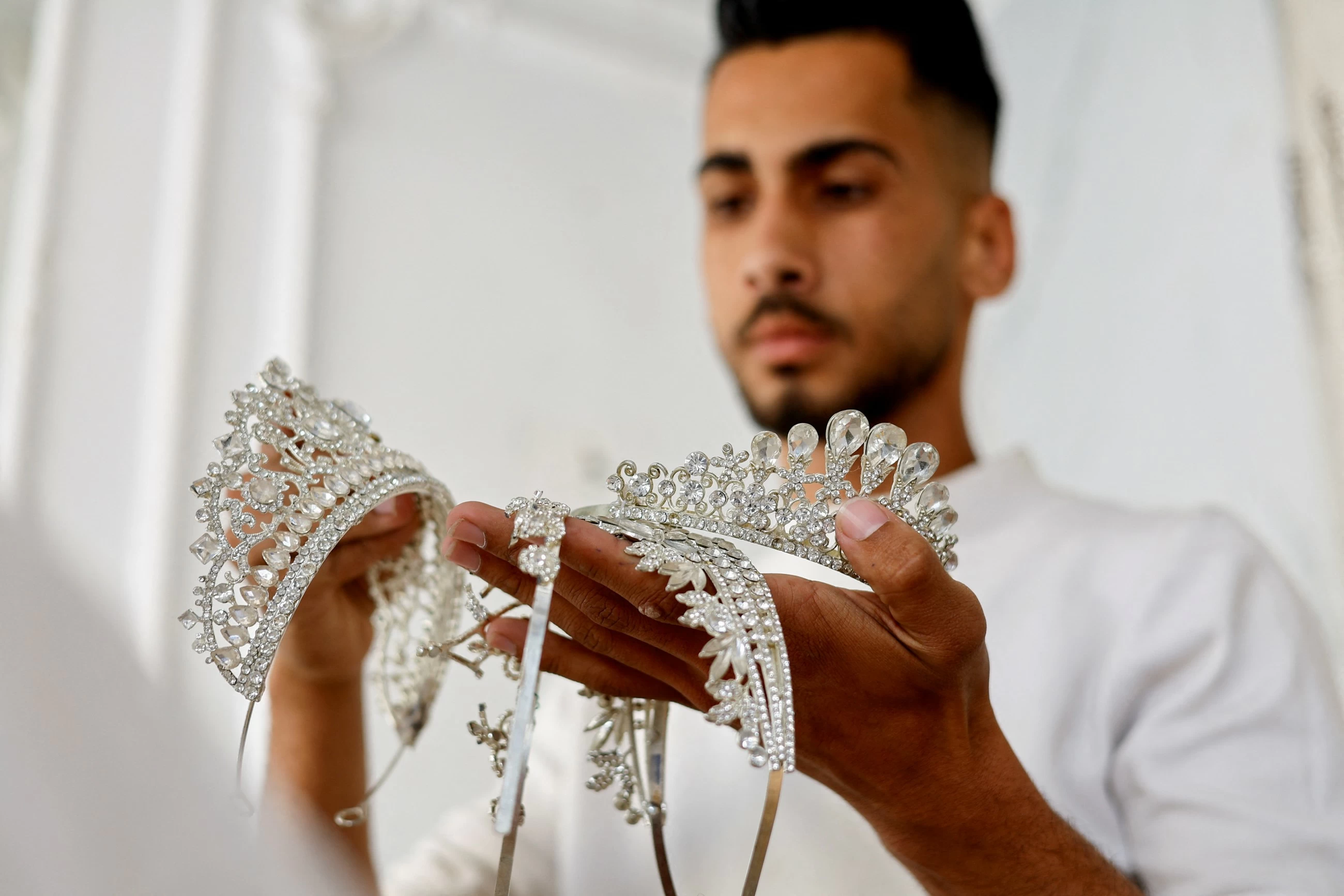 In war‑scarred Gaza, brides turn to refurbished wedding dresses