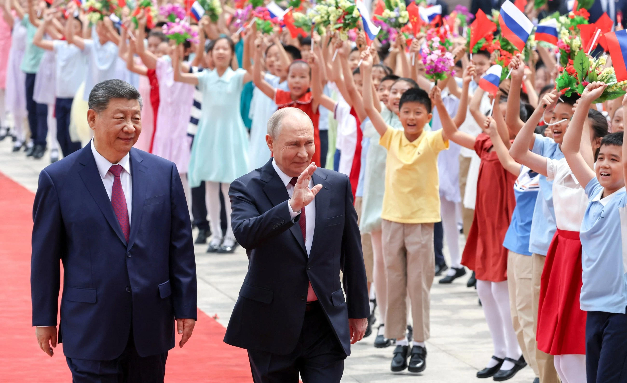 Putin, Xi hail 'unyielding' ties in talks after Trump visit