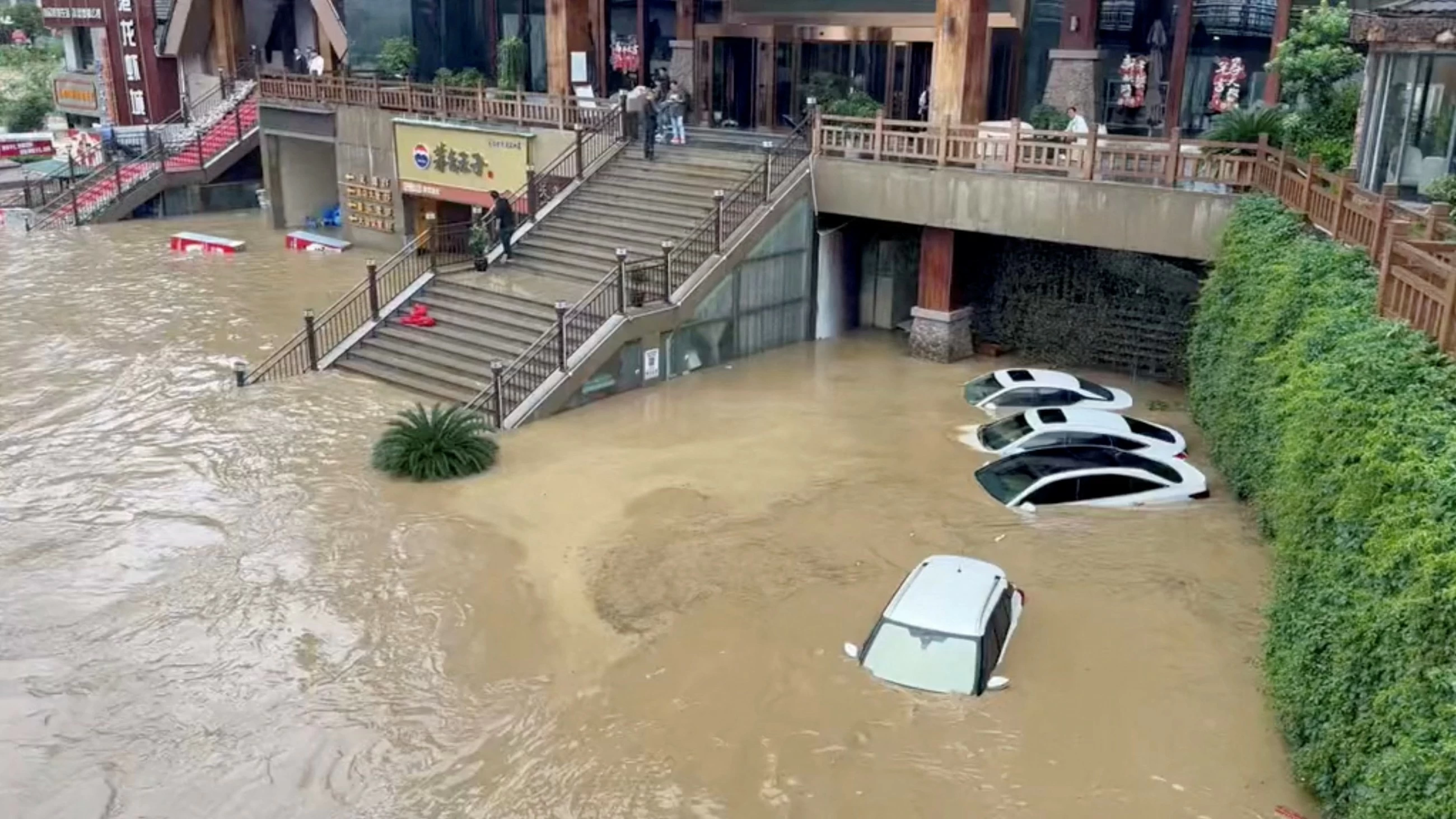 Death toll reaches 22 in China rains, 20 more missing