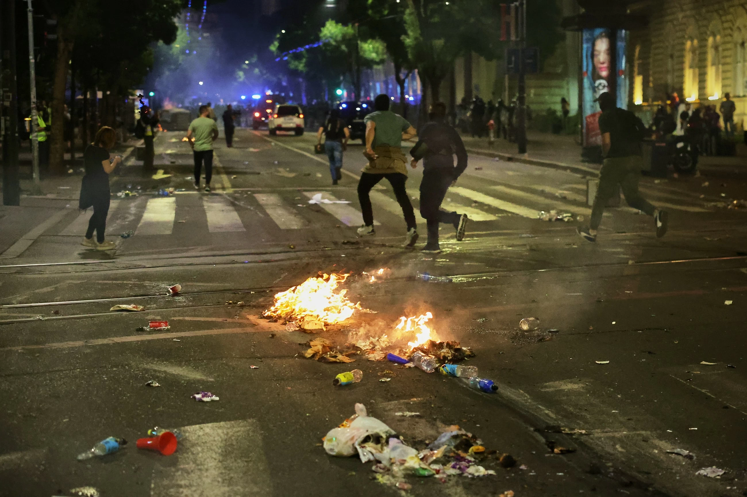 Protesters clash with police after an anti-government rally in Serbia's capital
