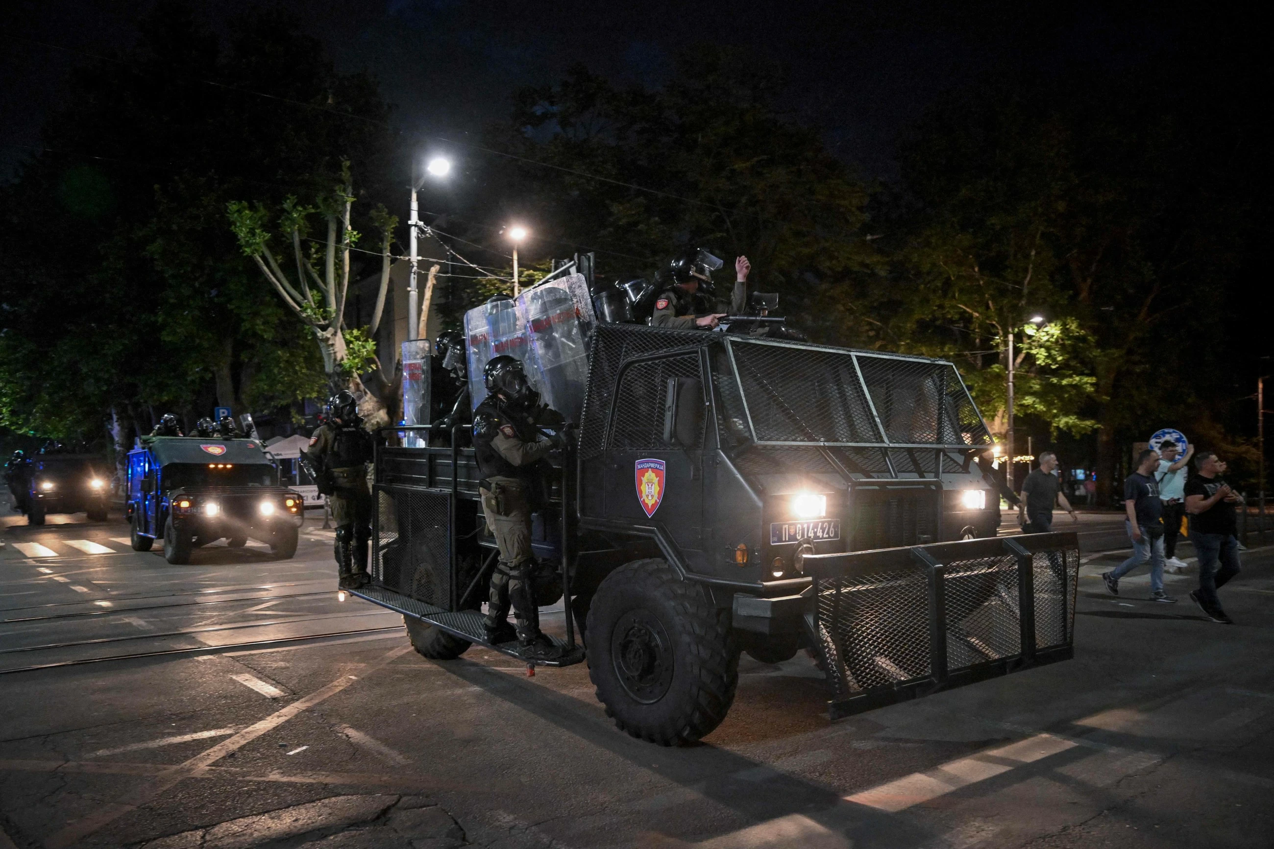 Protesters clash with police after an anti-government rally in Serbia's capital