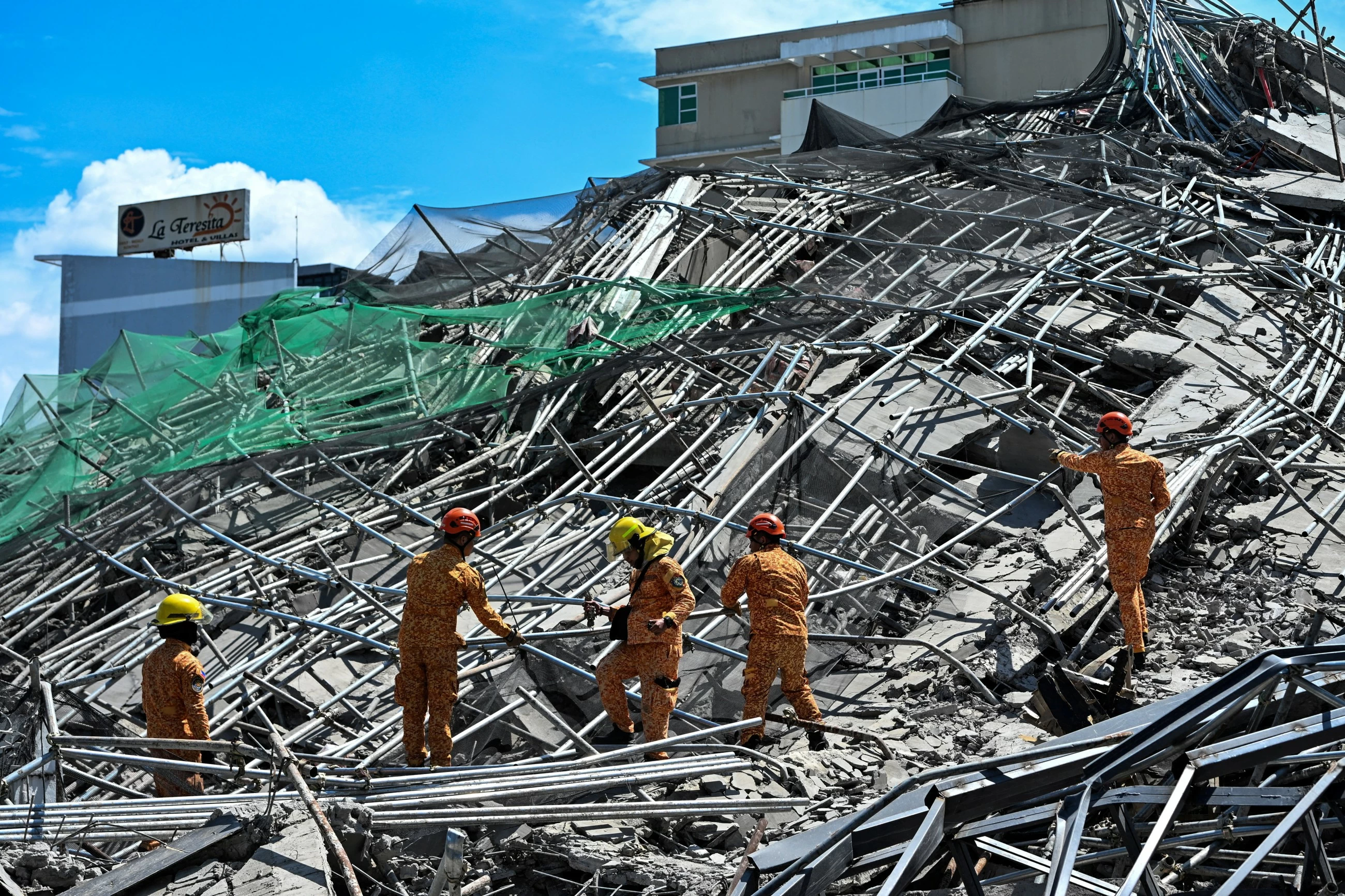 9-storey building in Philippines collapses, kills Malaysian man and leaves 20 missing