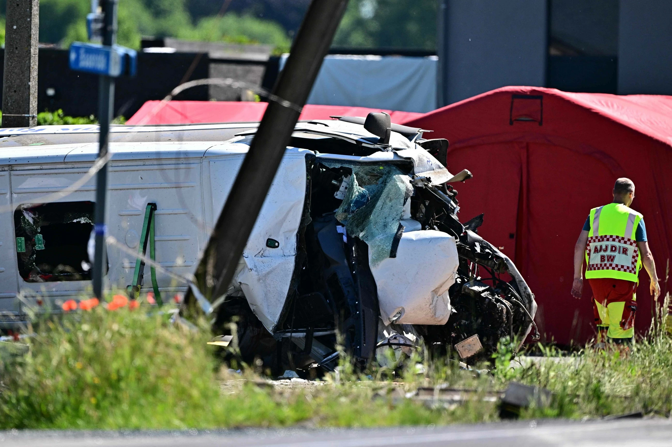 At least 4 killed in train collision with Belgian school bus