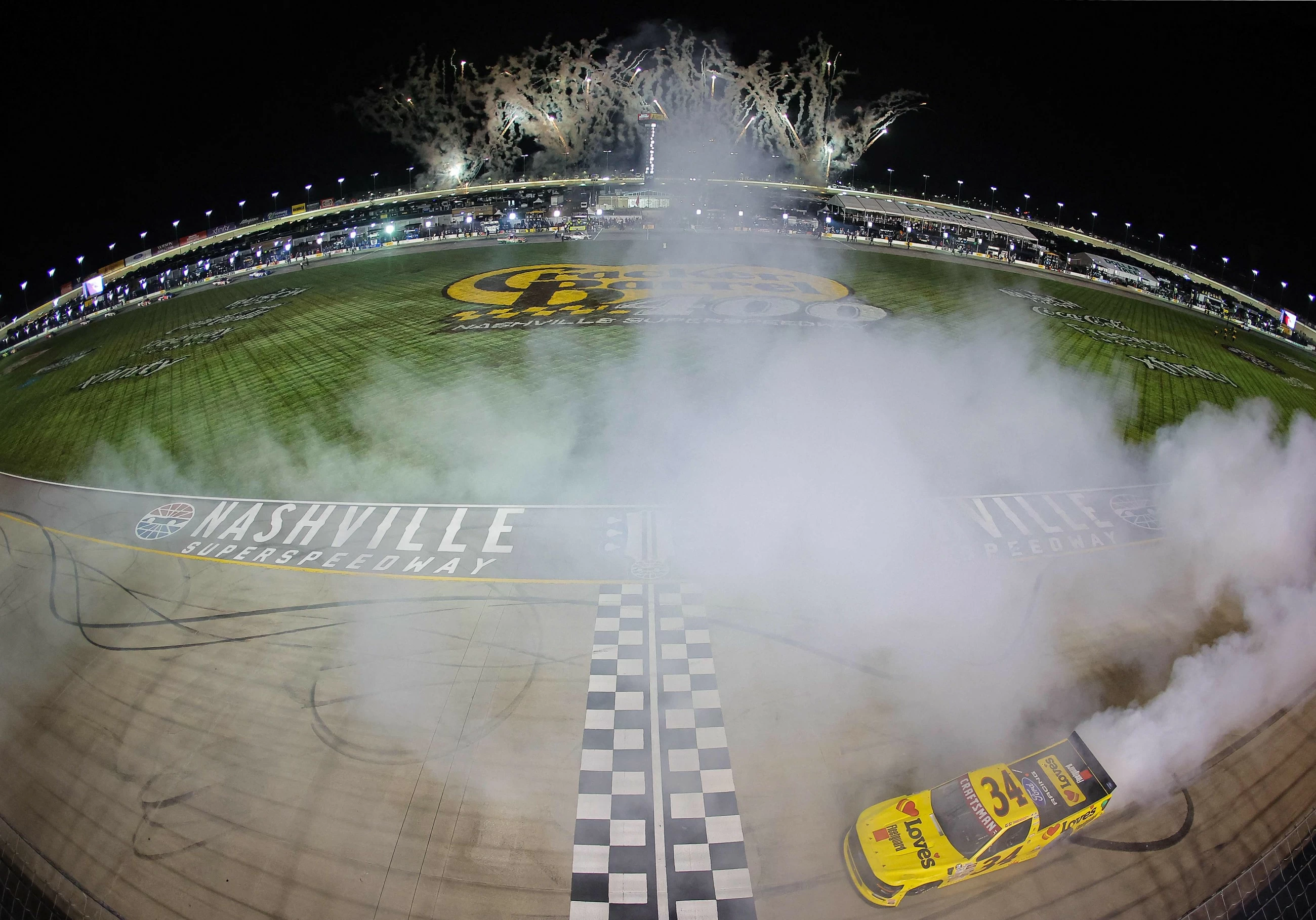 Layne Riggs delivers last-lap pass for Truck Series win at Nashville