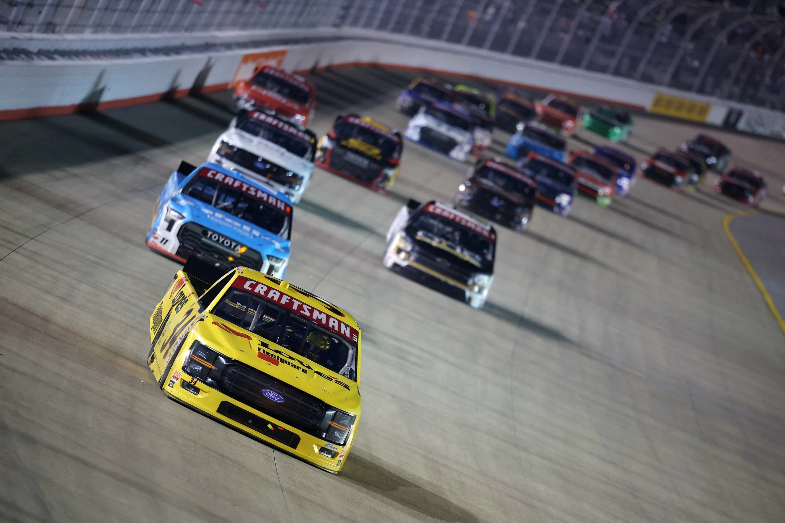 Layne Riggs delivers last-lap pass for Truck Series win at Nashville