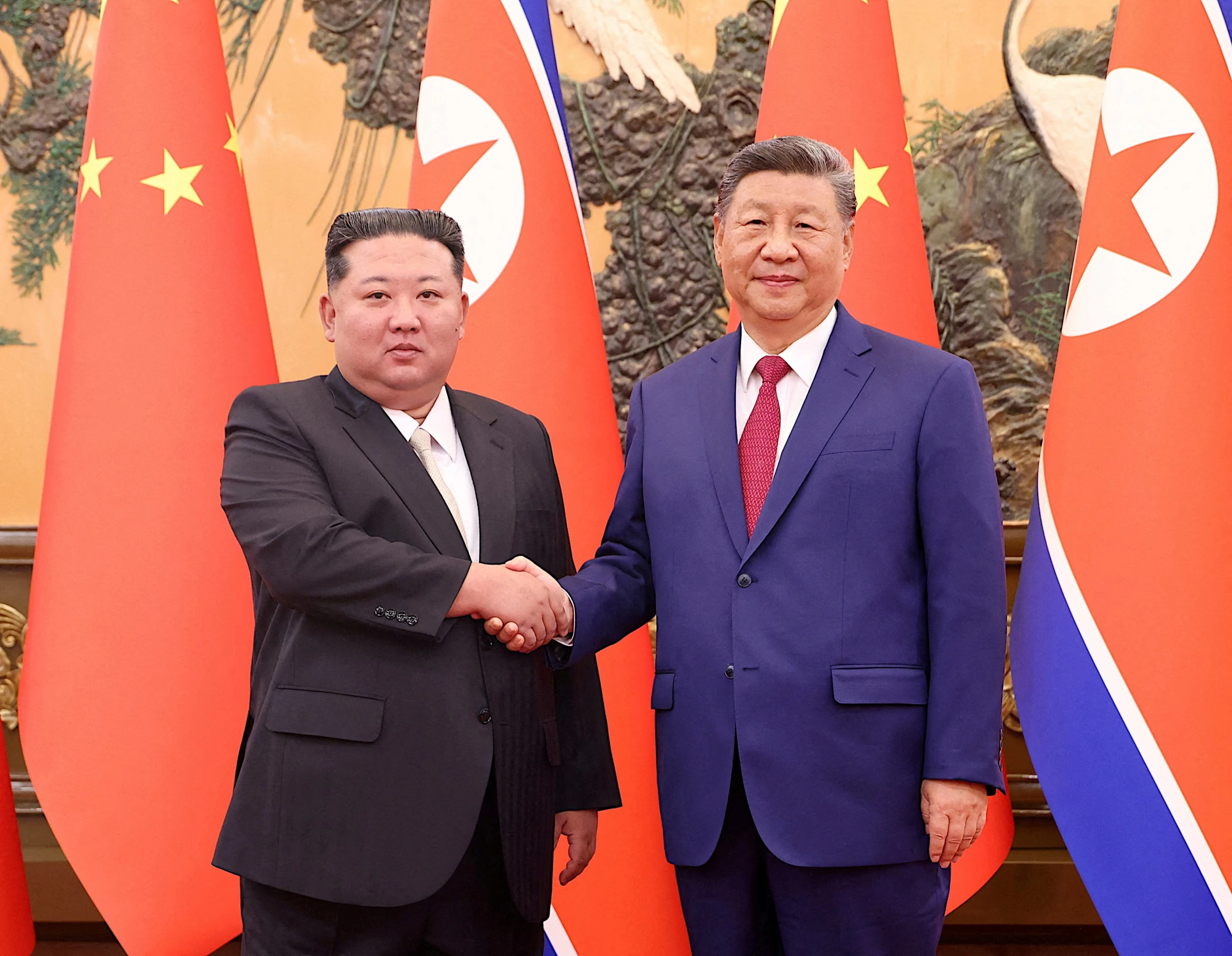 China's Xi in North Korea for rare visit