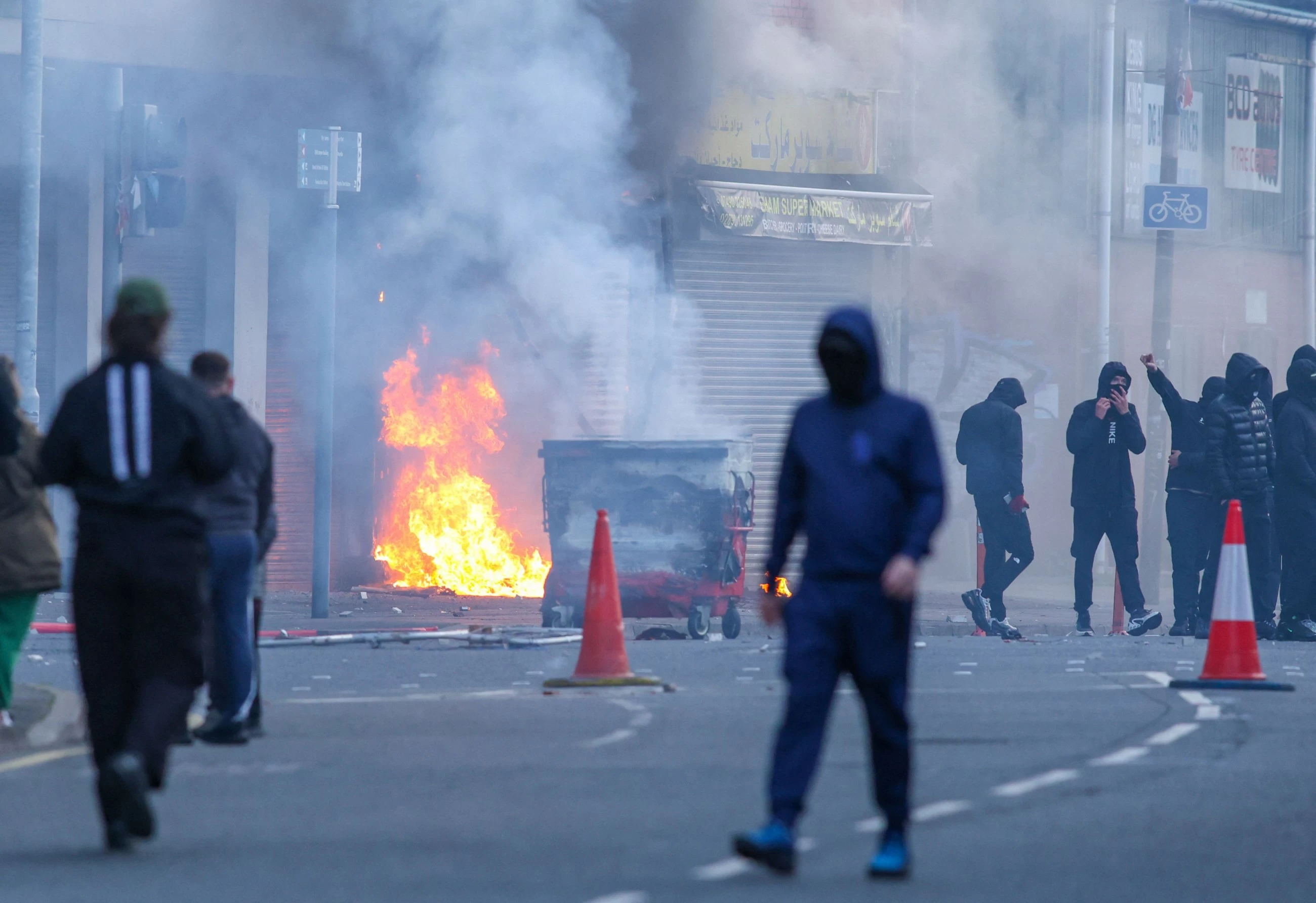 VIDEO: Homes set alight in Belfast anti-immigrant protests after 'brutal' knife attack