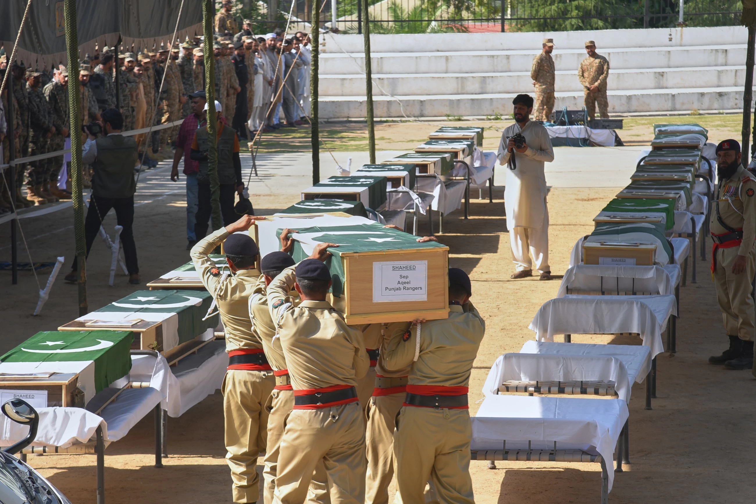 Soldiers mourn victims of army helicopter crash in Pakistan's AJK region