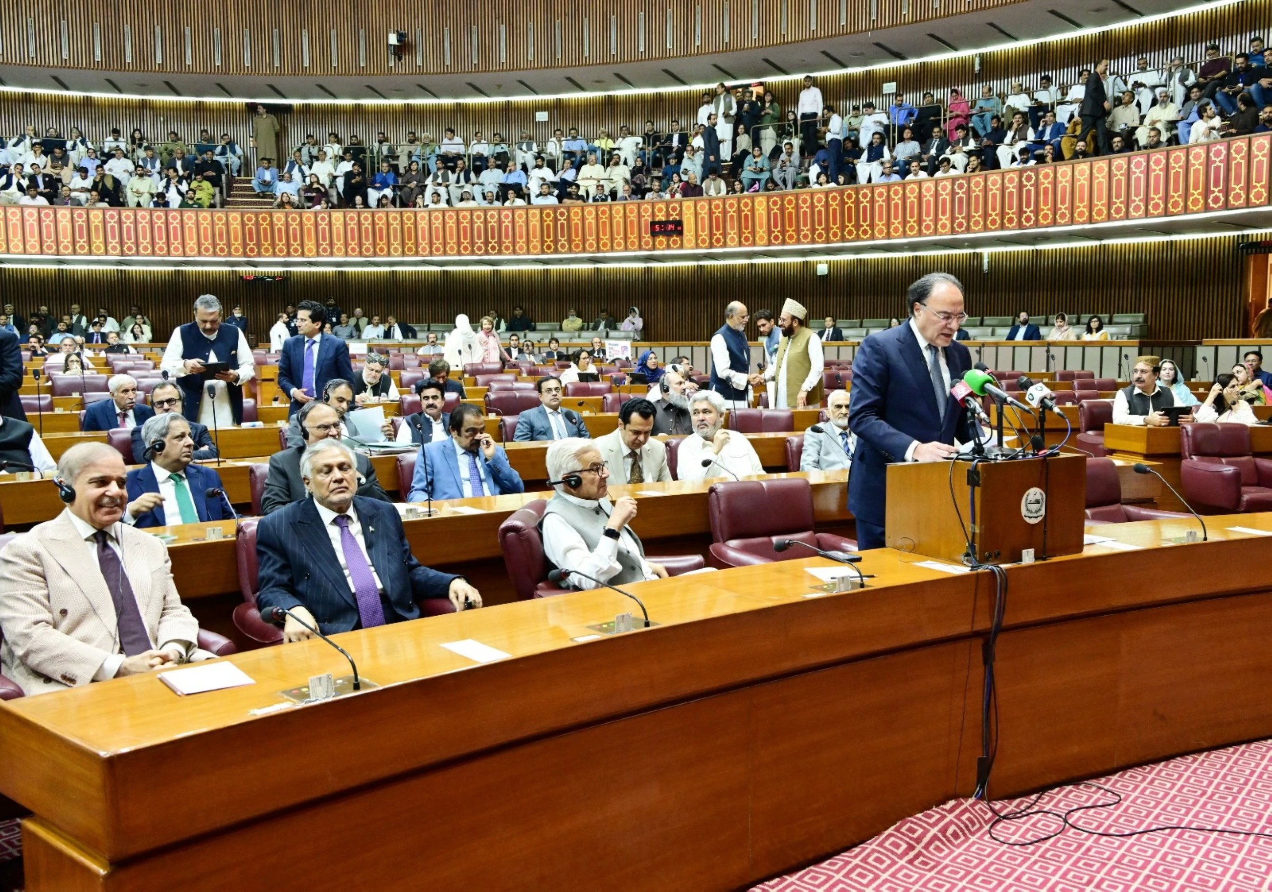 Pakistan budget raises defence spending, cuts development expenditure to meet IMF goals