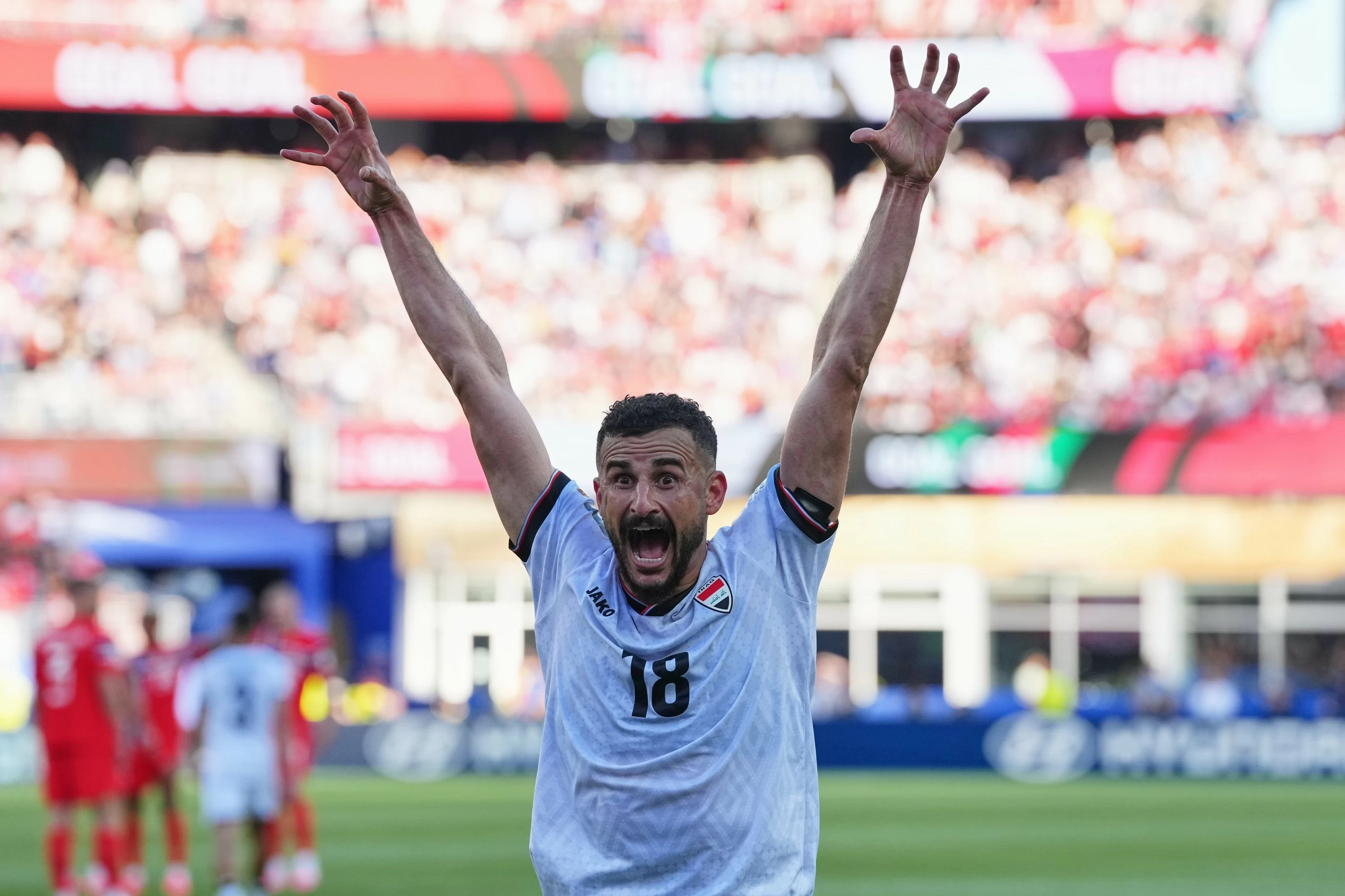 Detained by US customs 2 weeks ago, Hussein scores for Iraq in his World Cup debut