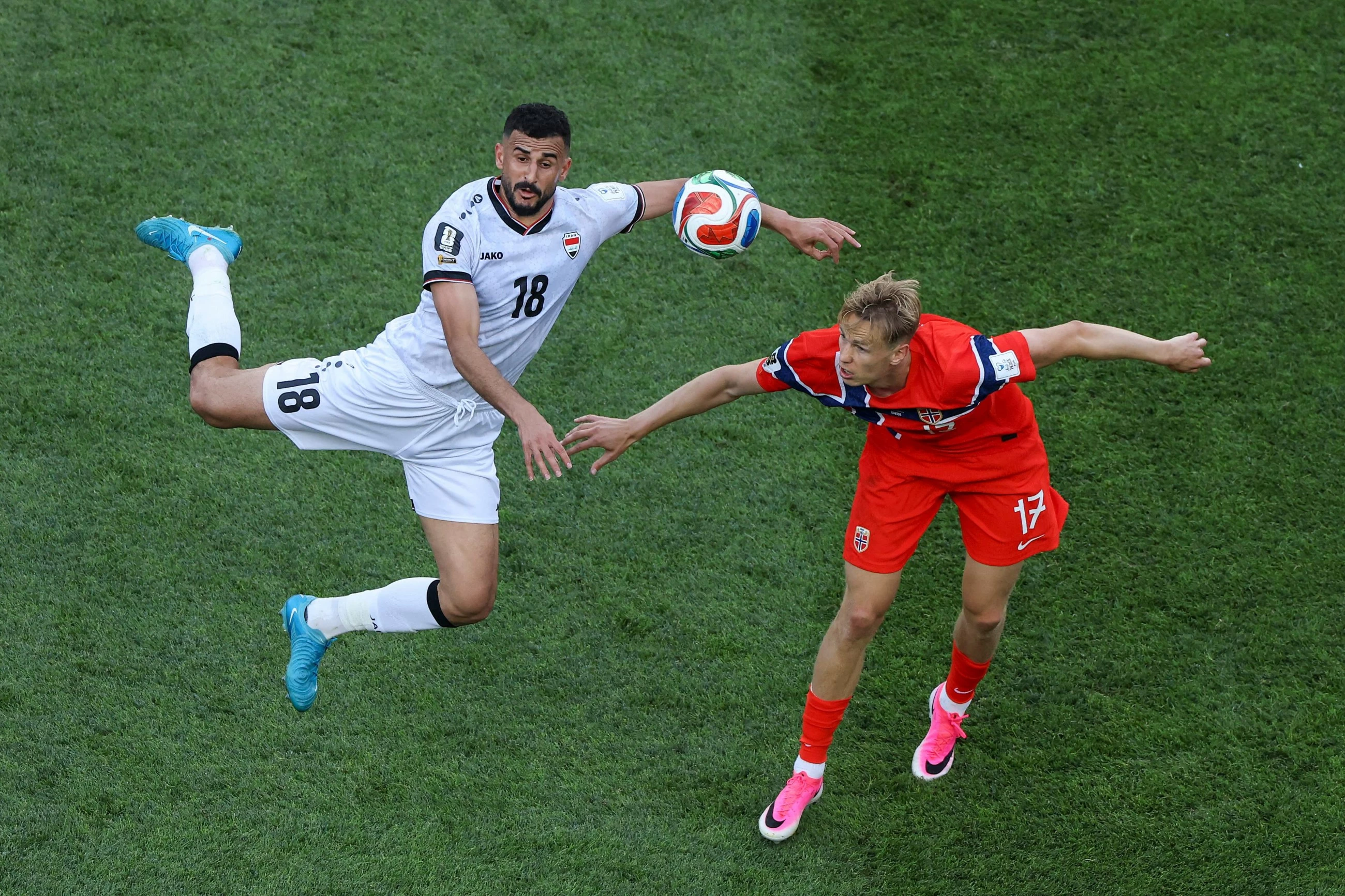 Detained by US customs 2 weeks ago, Hussein scores for Iraq in his World Cup debut