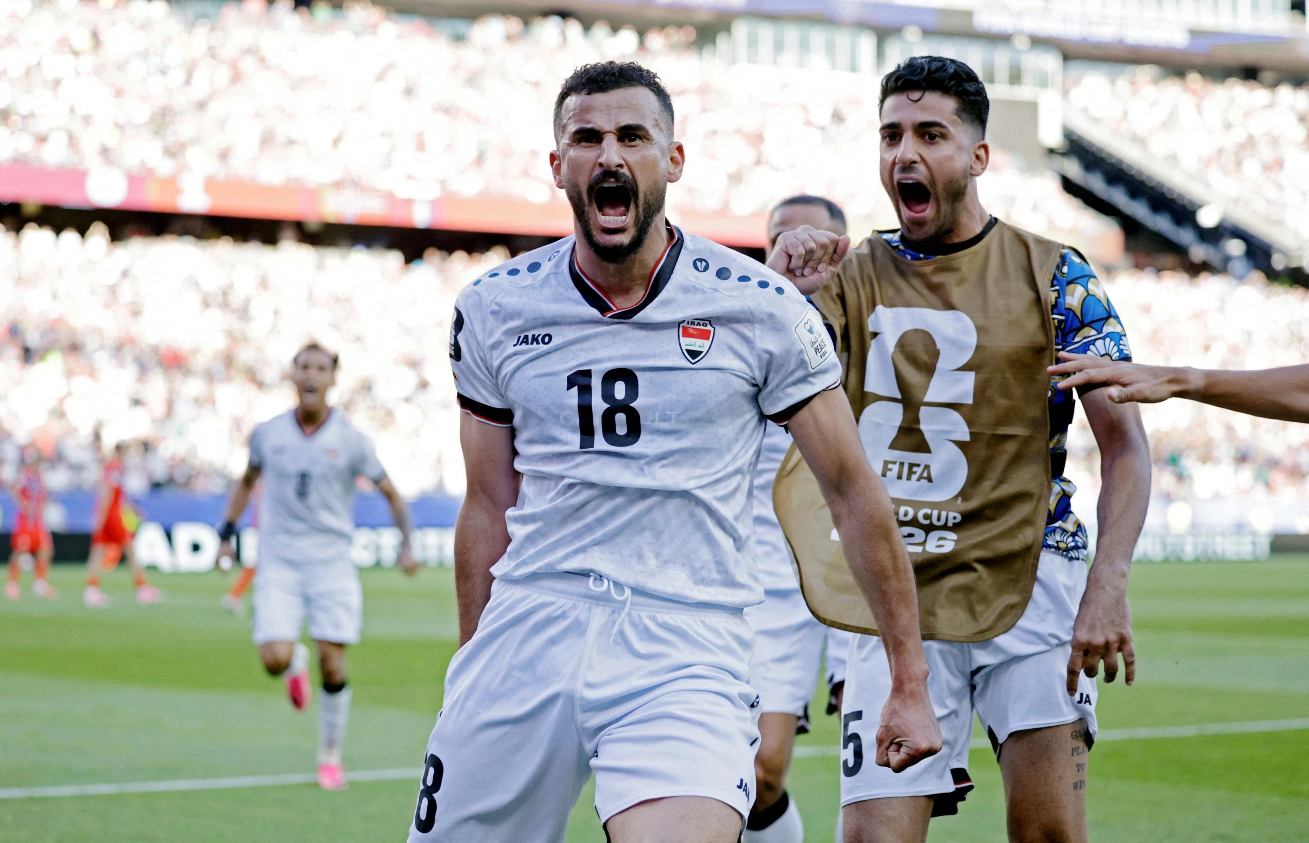 Detained by US customs 2 weeks ago, Hussein scores for Iraq in his World Cup debut