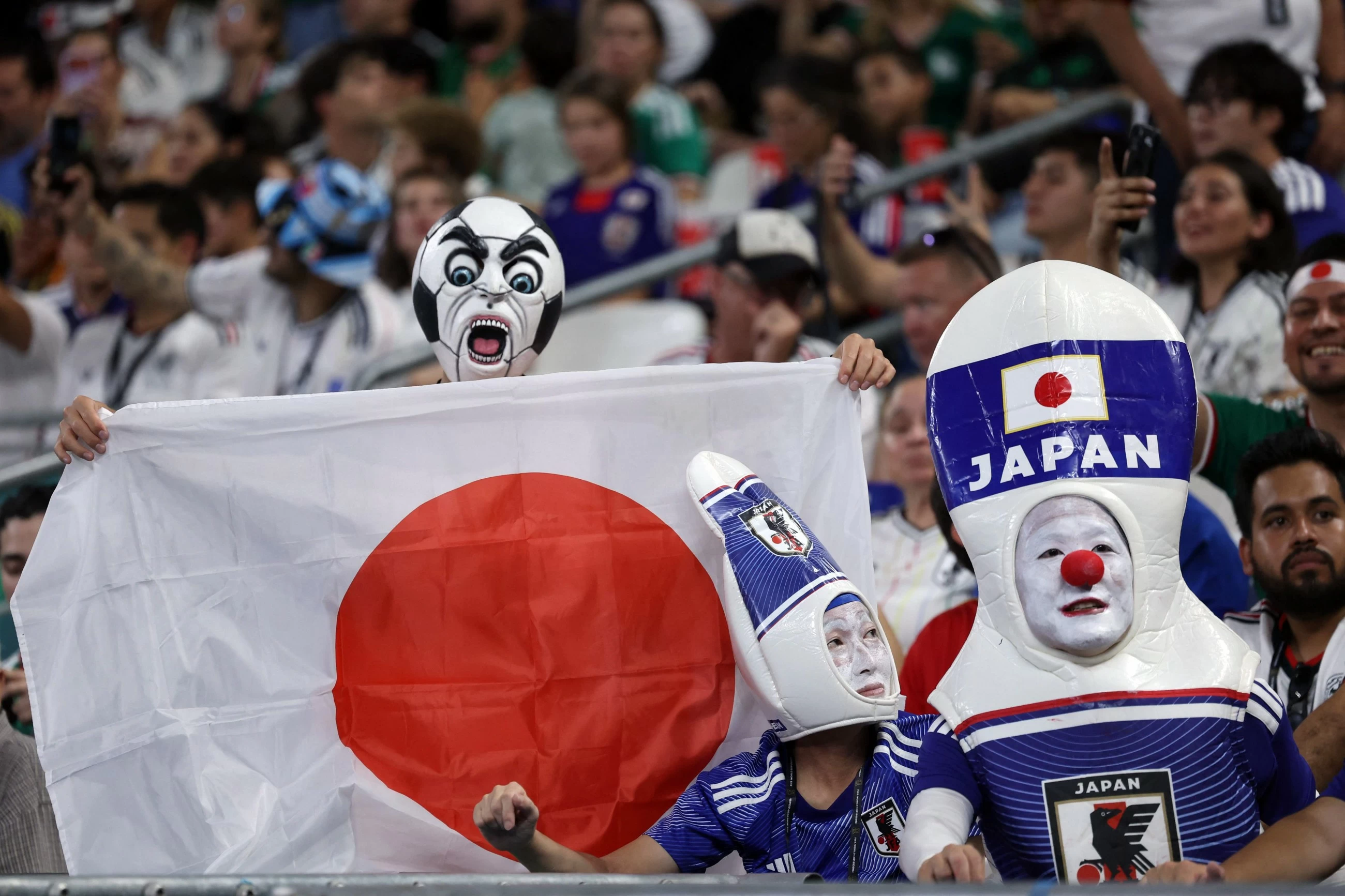 Japan stroll to victory over Tunisia in World Cup's 1,000th game