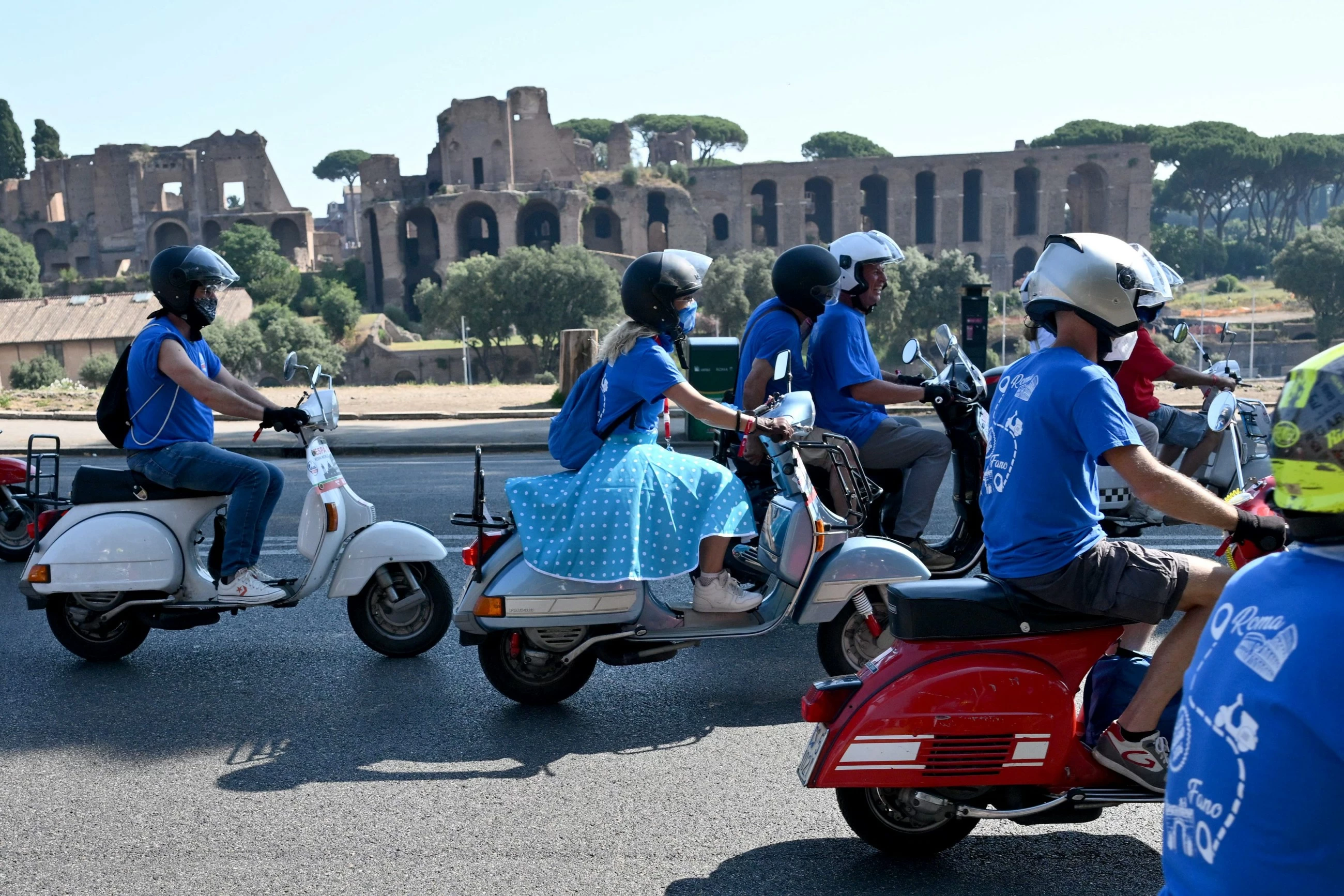 Thousands ride through Rome as Italy’s iconic scooter Vespa turns 80