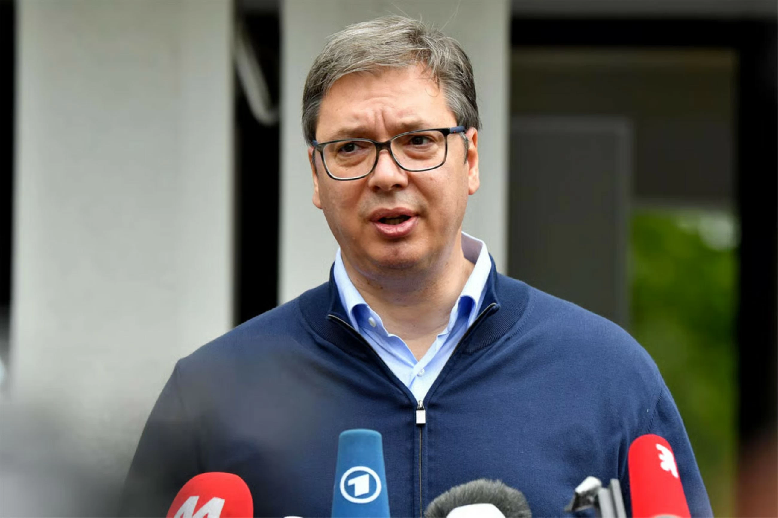 Serbian critics of President Vucic skeptical of his announcement to resign