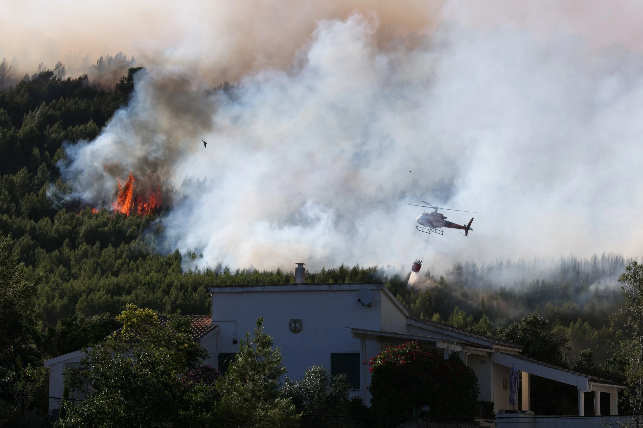 Wildfires rage in southern France, nearly 3,000 people evacuated
