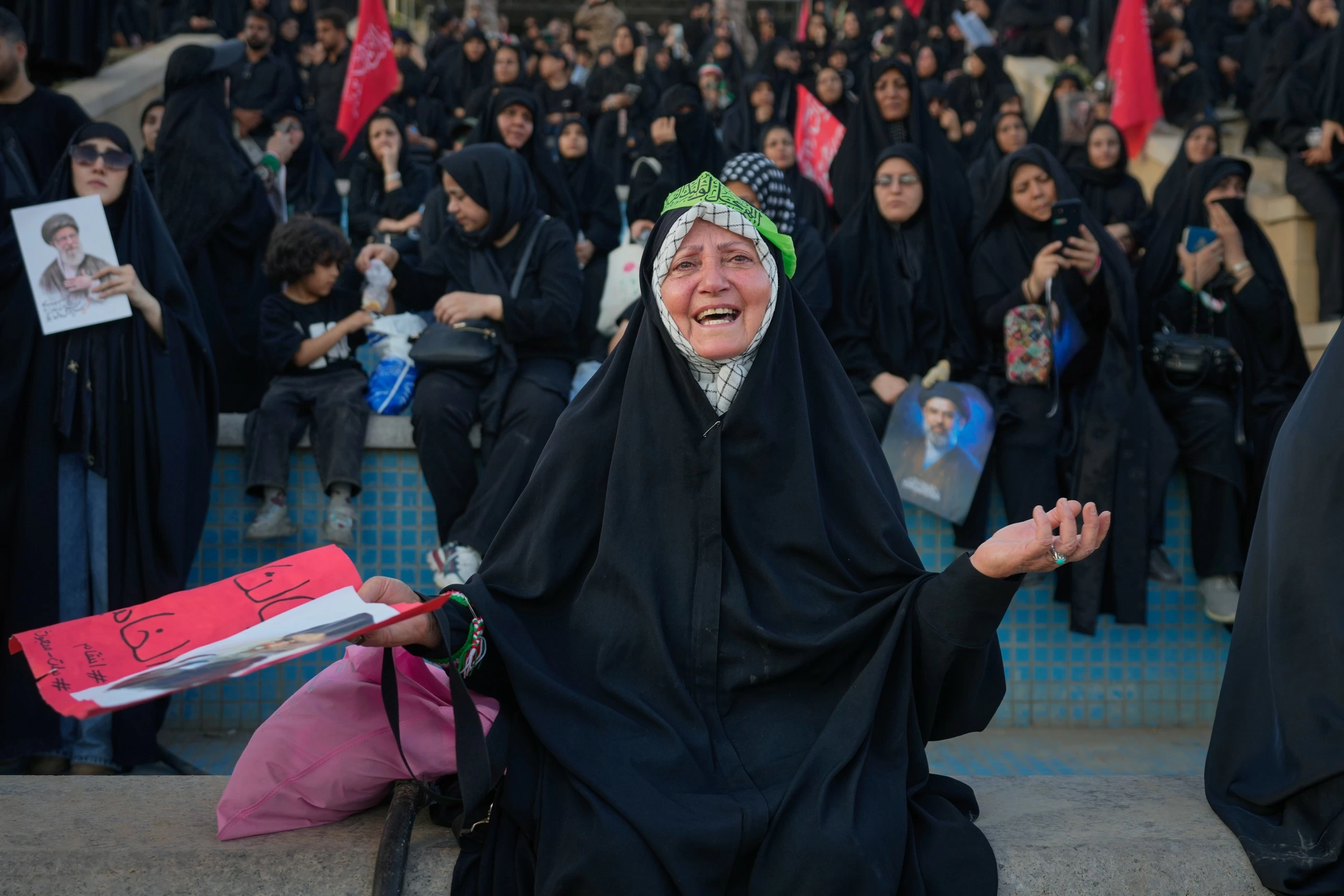 Three sons of Iran's slain leader Khamenei appear at funeral, not his successor
